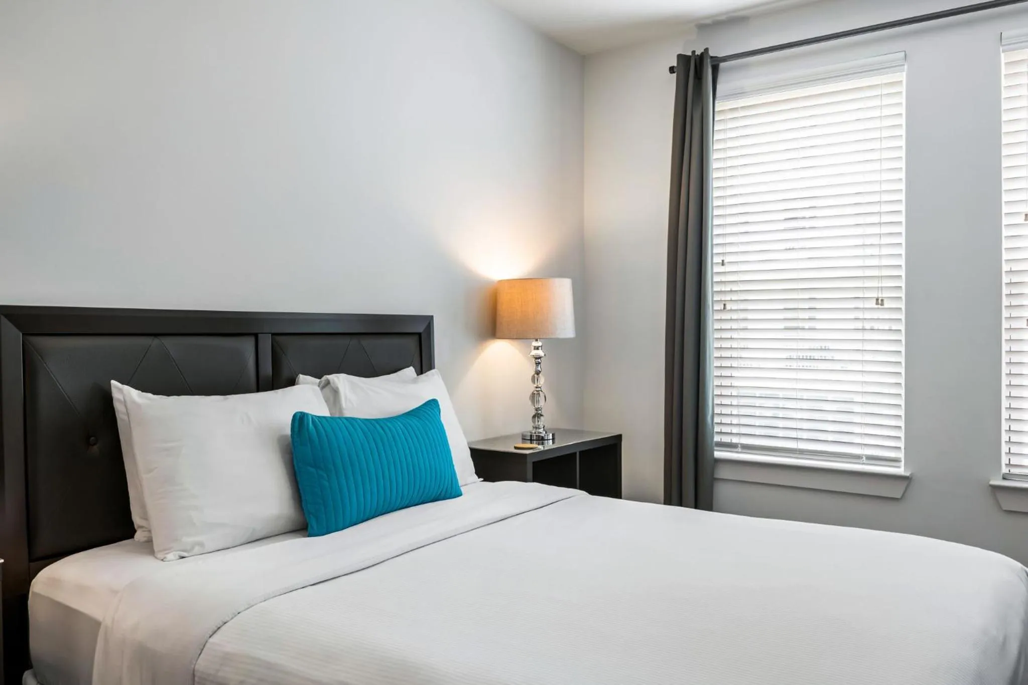 Bed in BCA Furnished Apartments