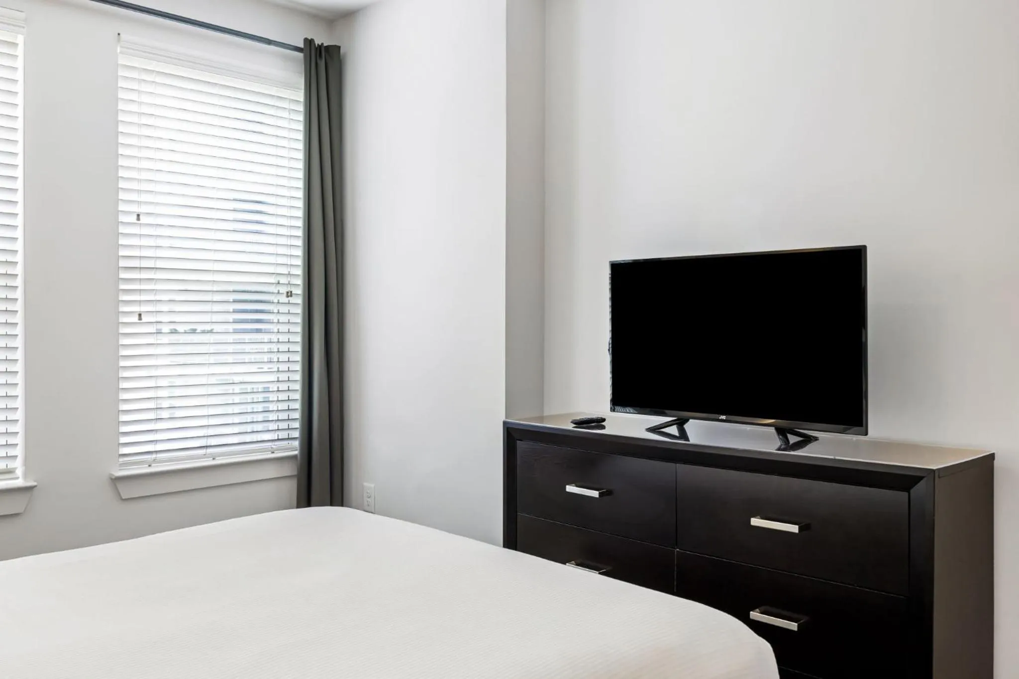 Bed in BCA Furnished Apartments