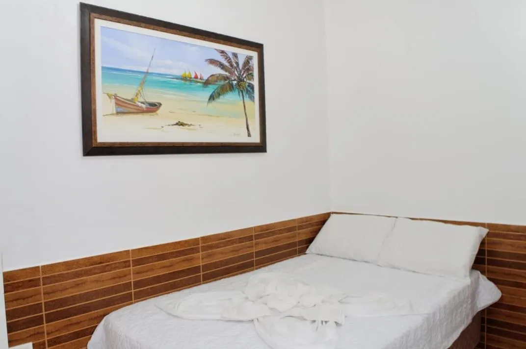 Bed in Pousada Recanto do Amanhecer