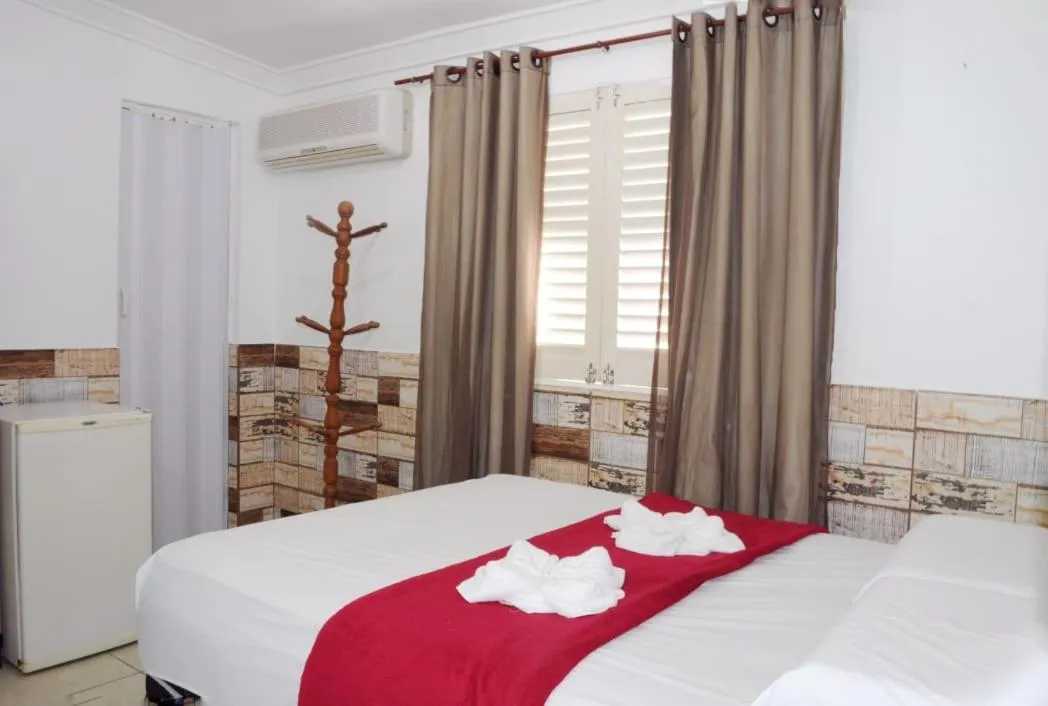 Bed in Pousada Recanto do Amanhecer