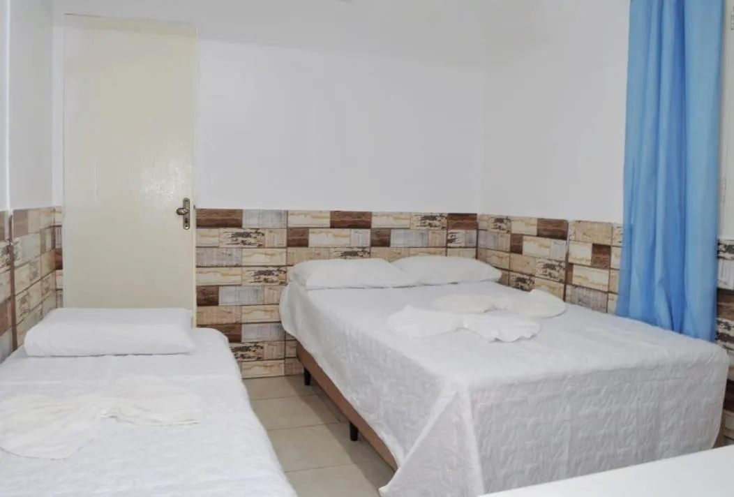 Bed in Pousada Recanto do Amanhecer