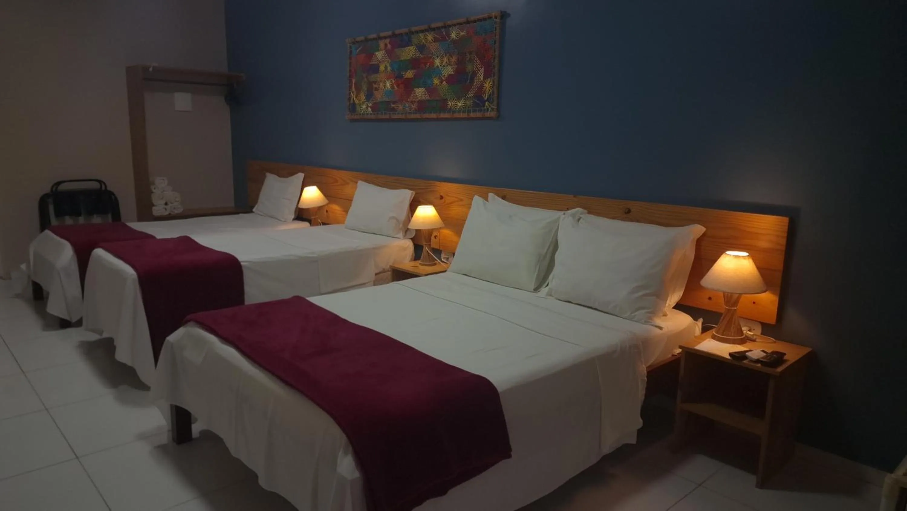 Bed in Pousada Maresia
