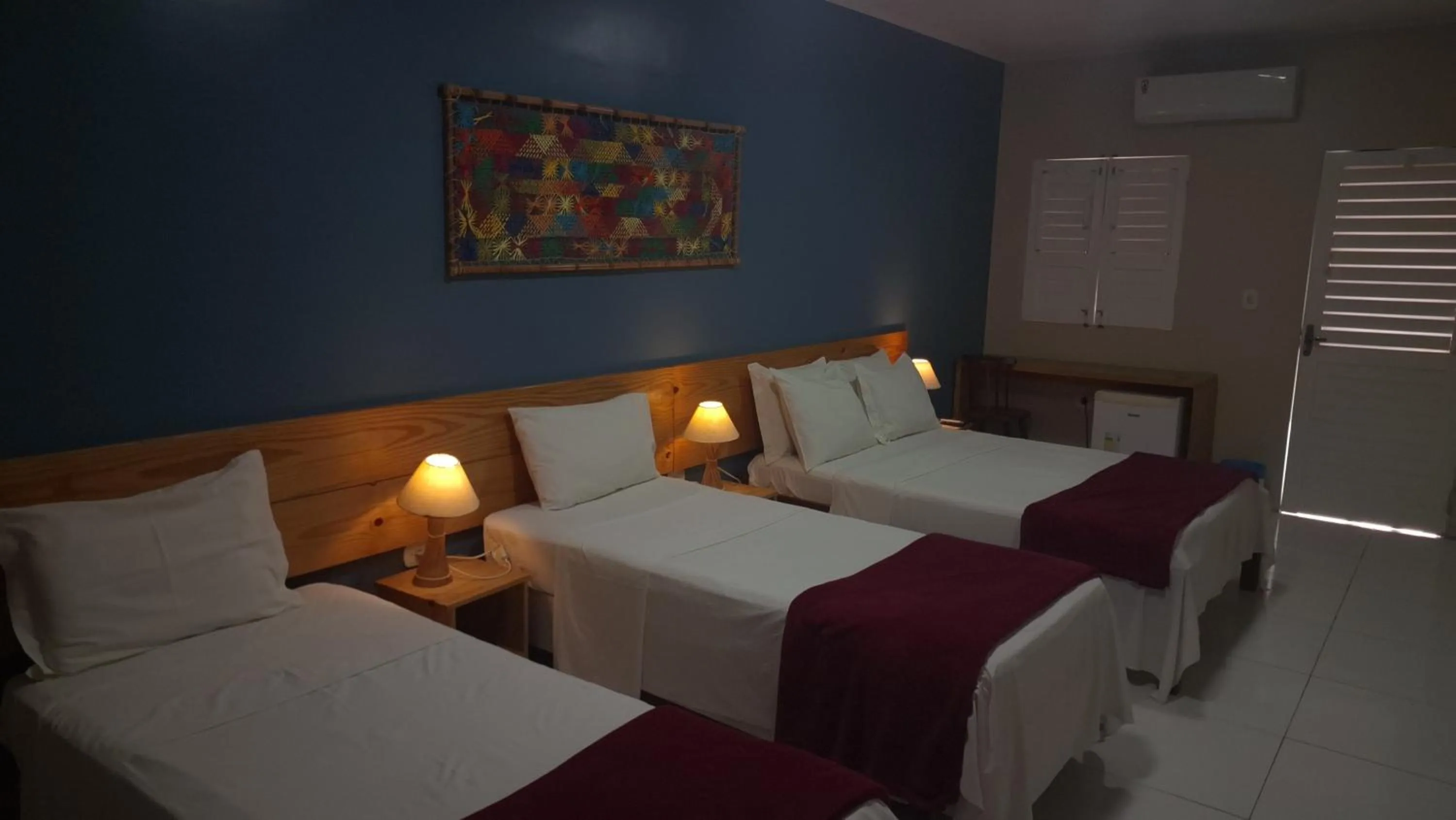 Bed in Pousada Maresia