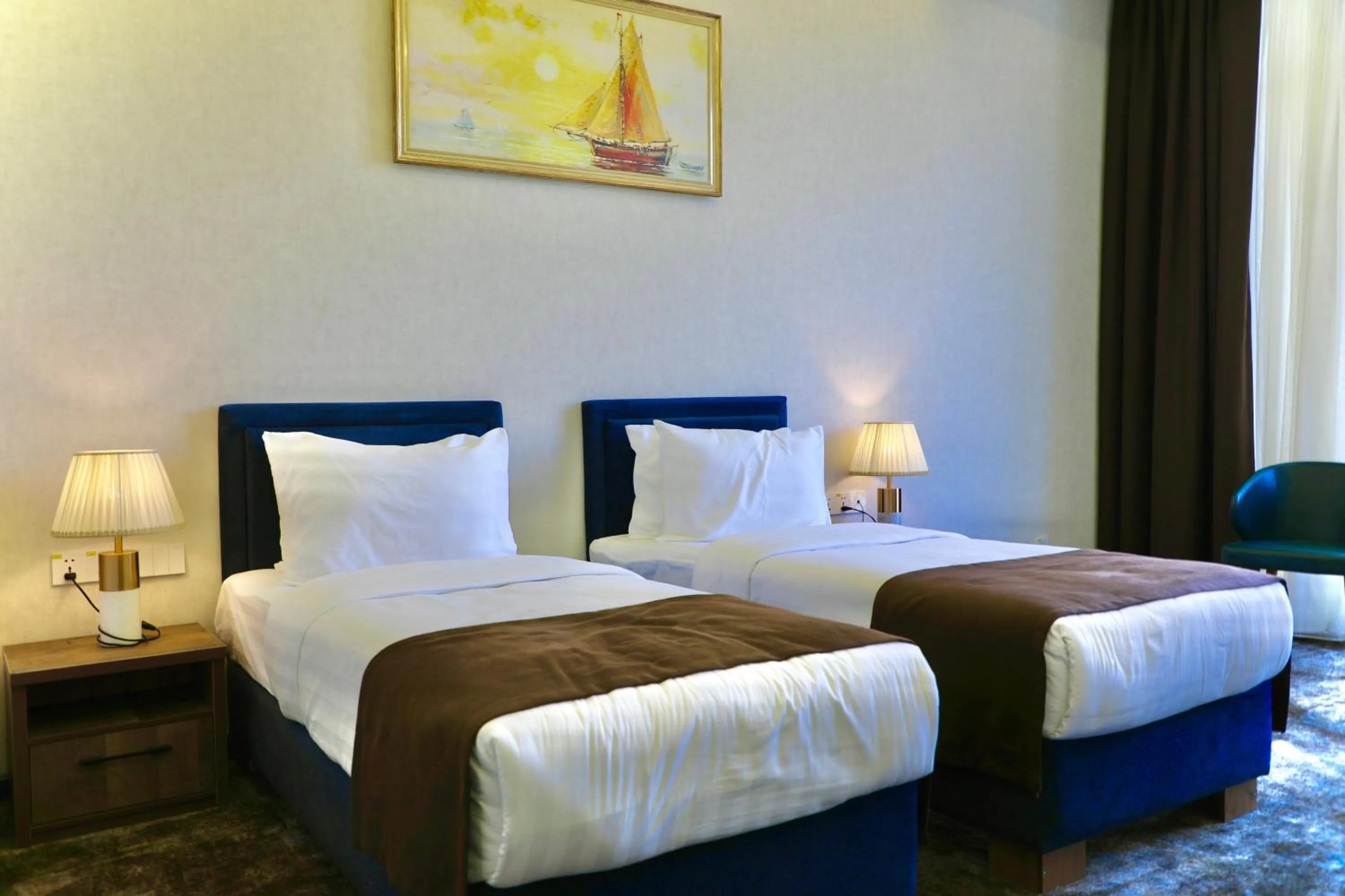 Bed in Garnet Mir Hotel