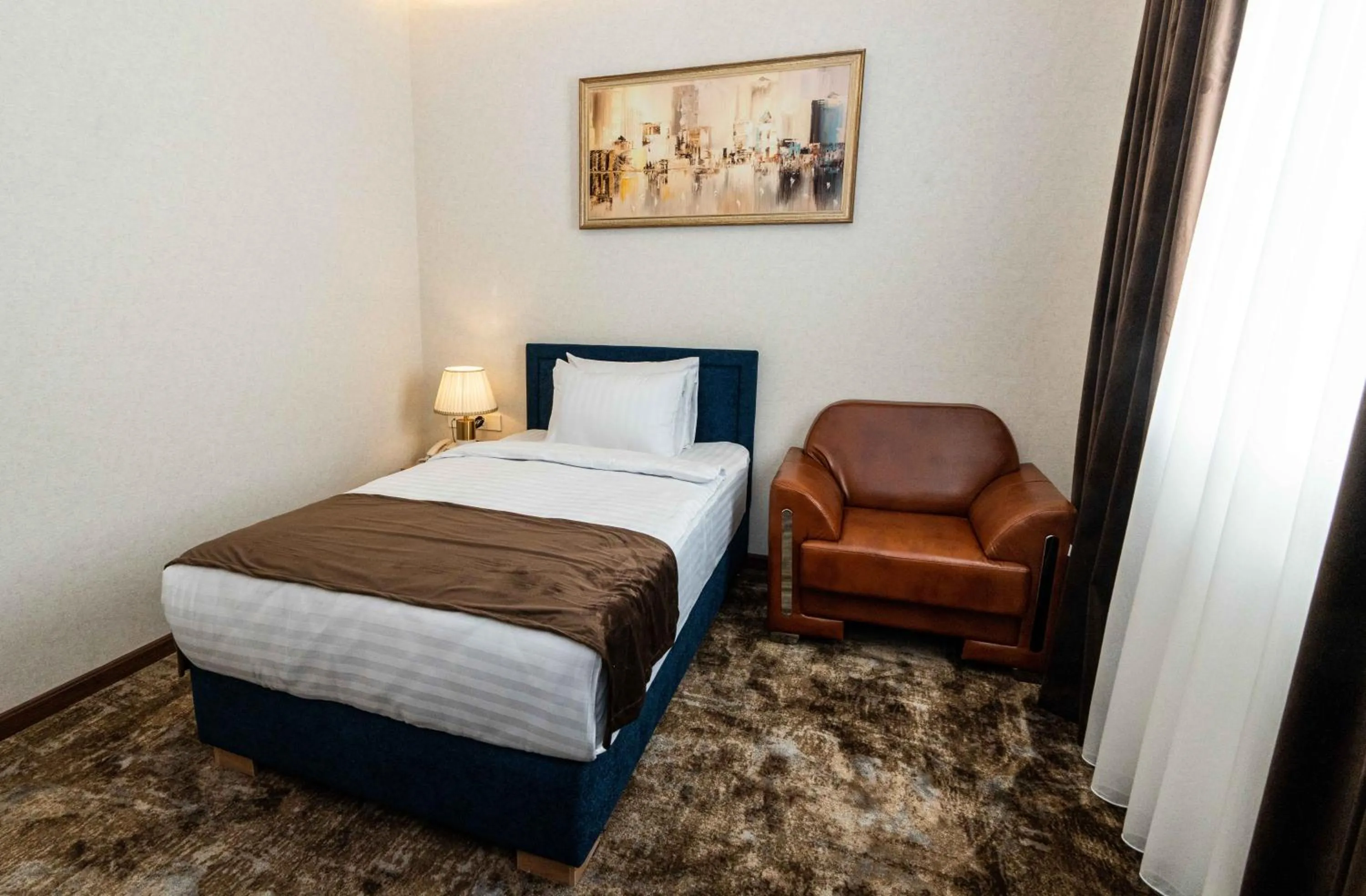 Bed in Garnet Mir Hotel