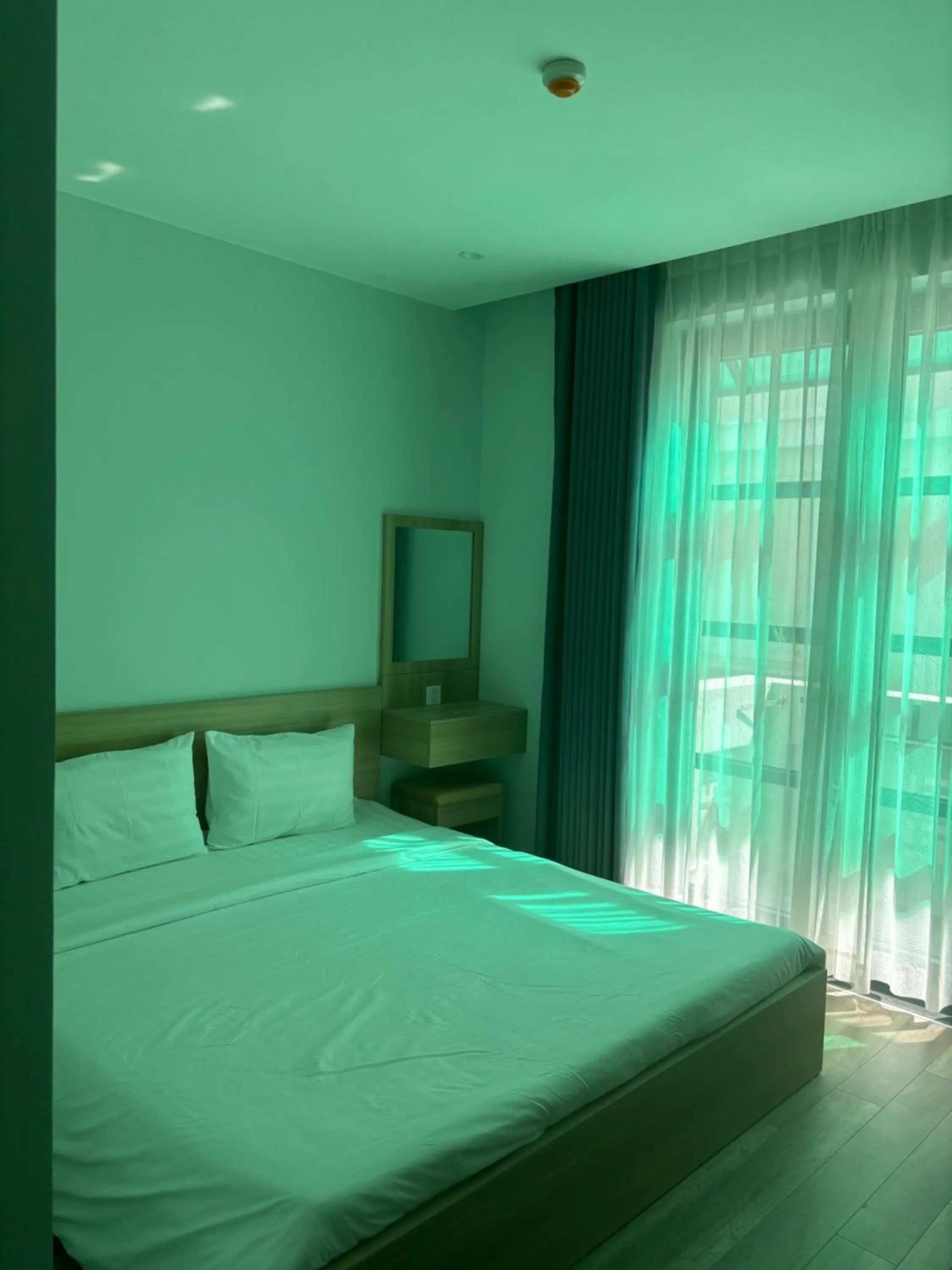 Bed in Green Inn Phu Quoc Hotel