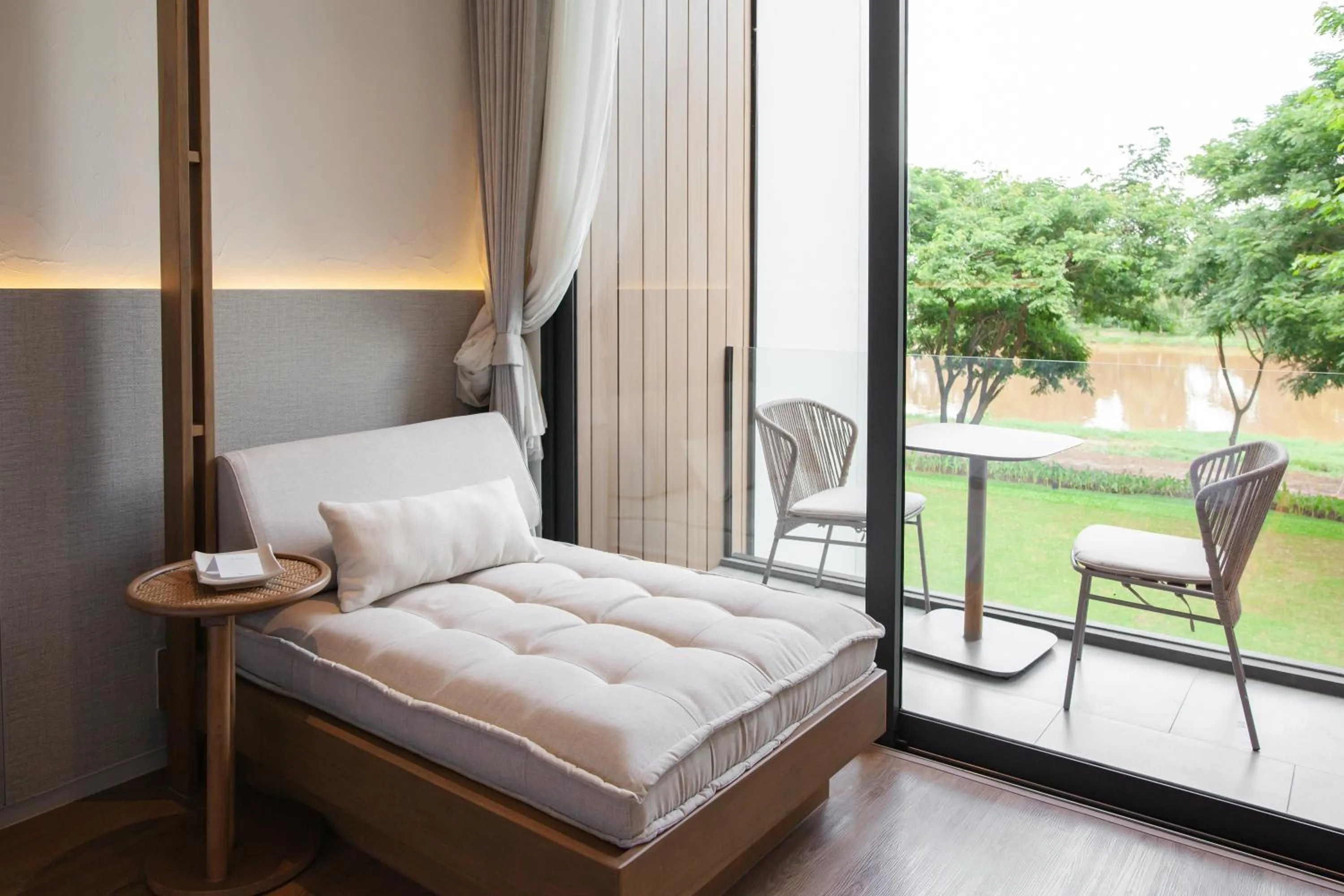 Balcony/Terrace, Bed in Riva Vista Riverfront Resort Chiang Rai