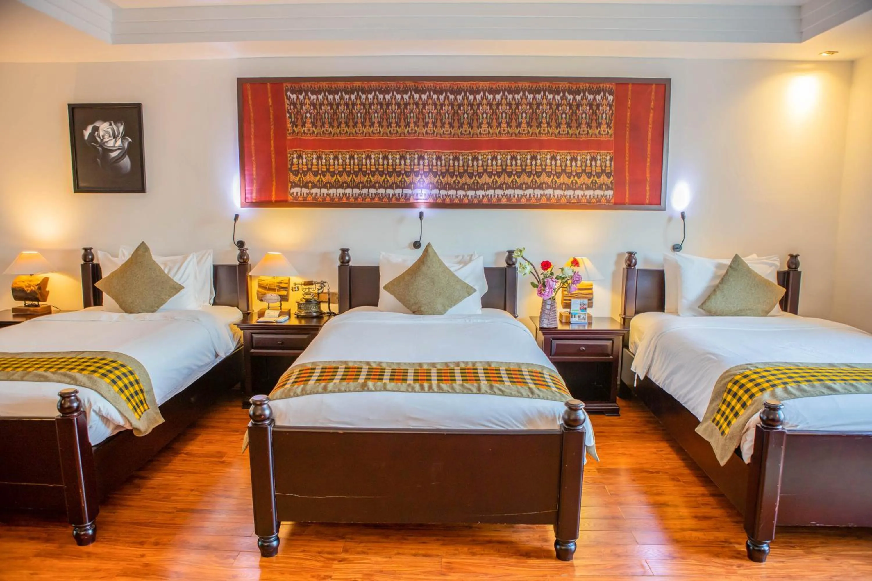 Bed in La Rose Suites