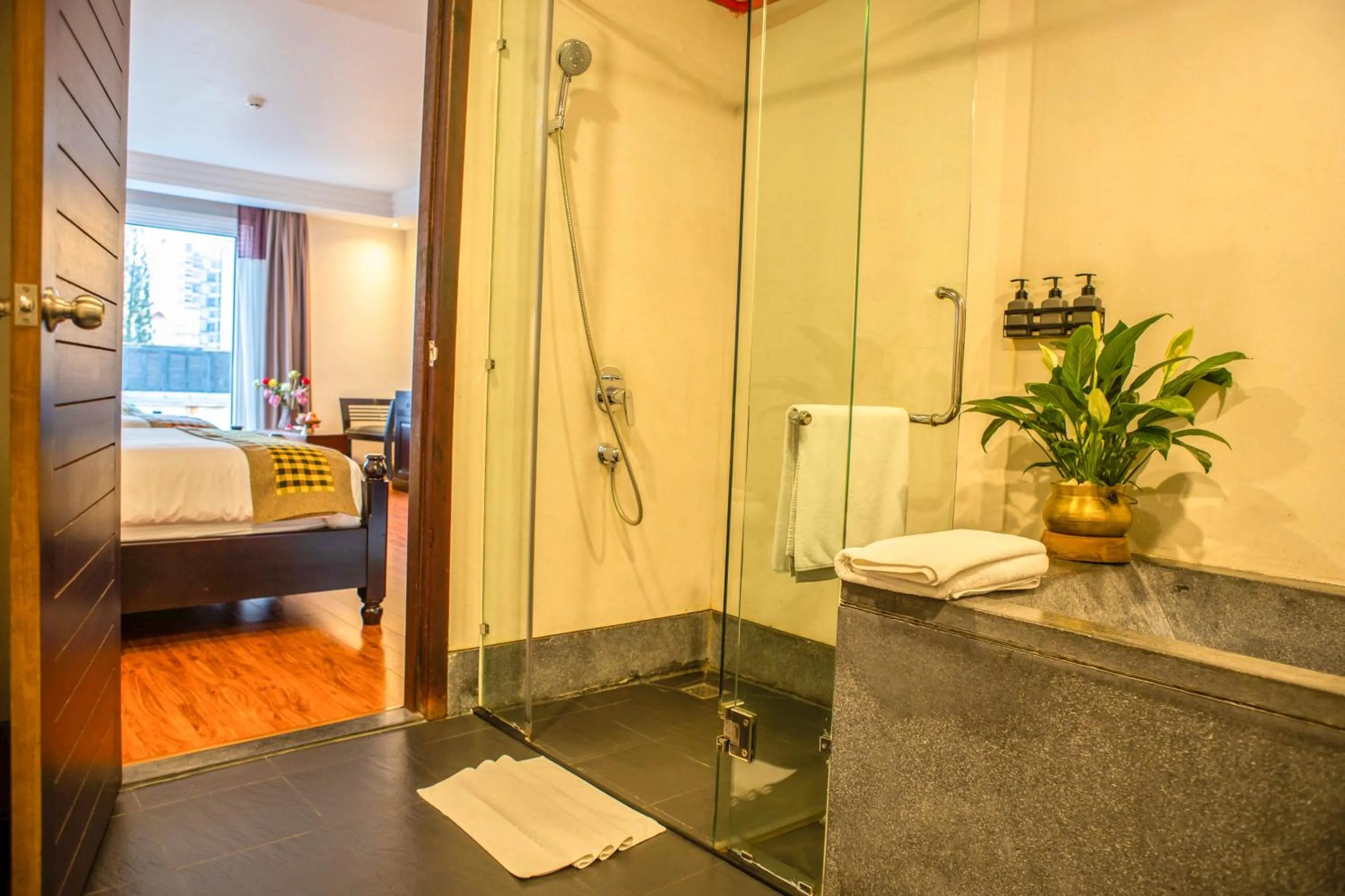 Bed in La Rose Suites