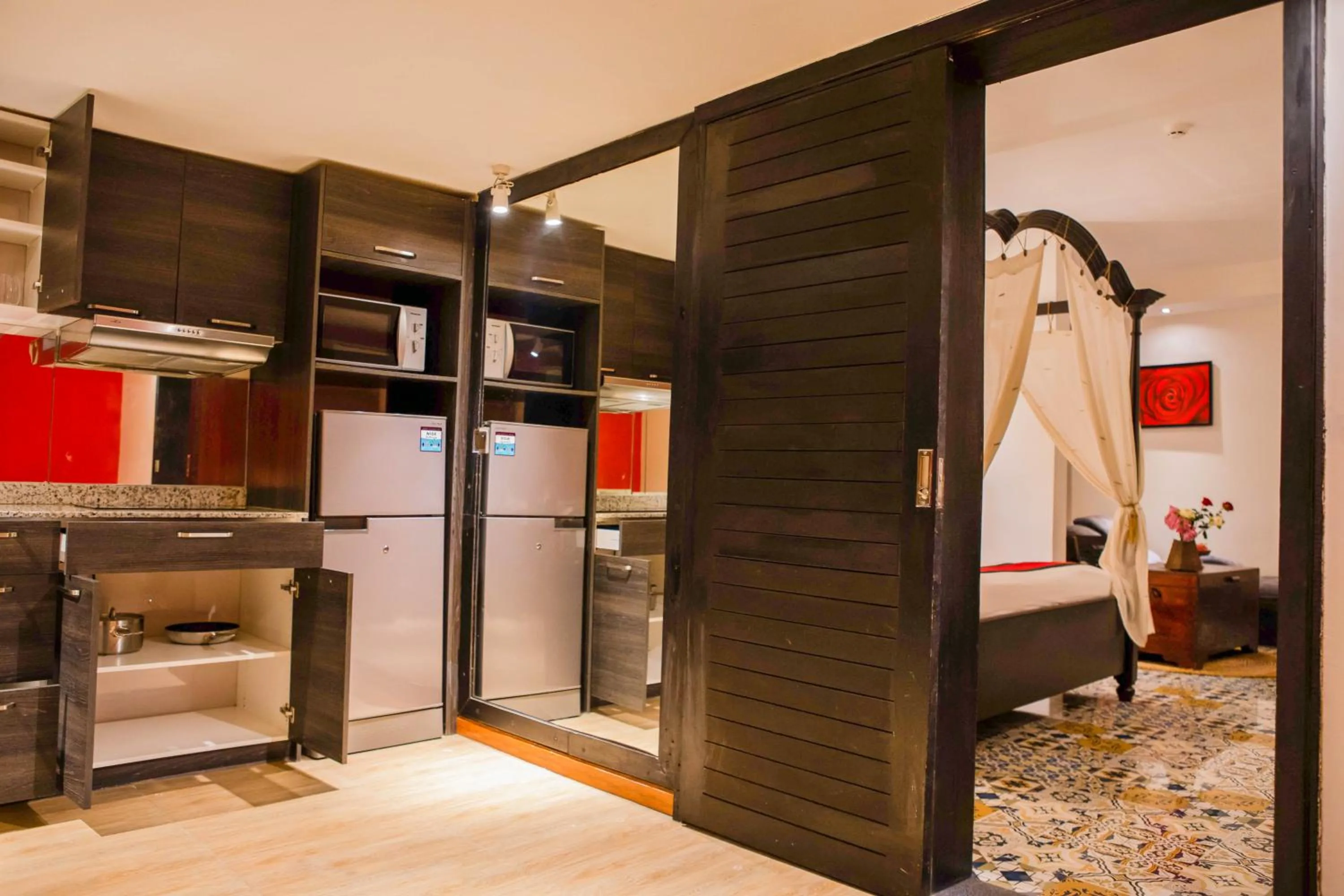 Bed in La Rose Suites