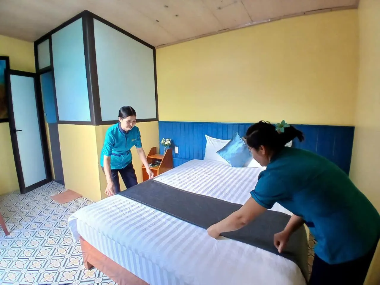 People, Bed in Catba Papillon Garden Bungalows & Resort