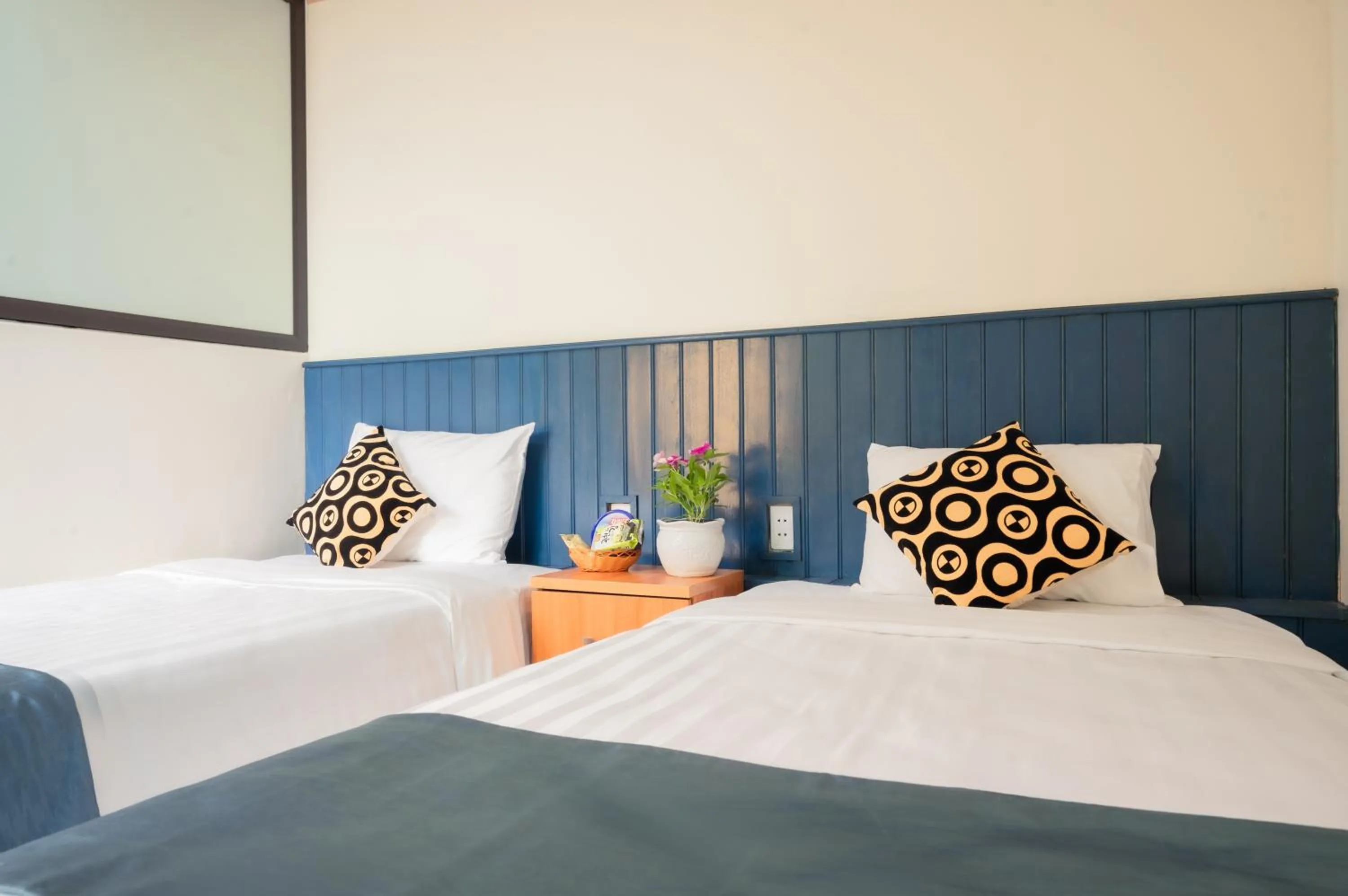 Bed in Catba Papillon Garden Bungalows & Resort