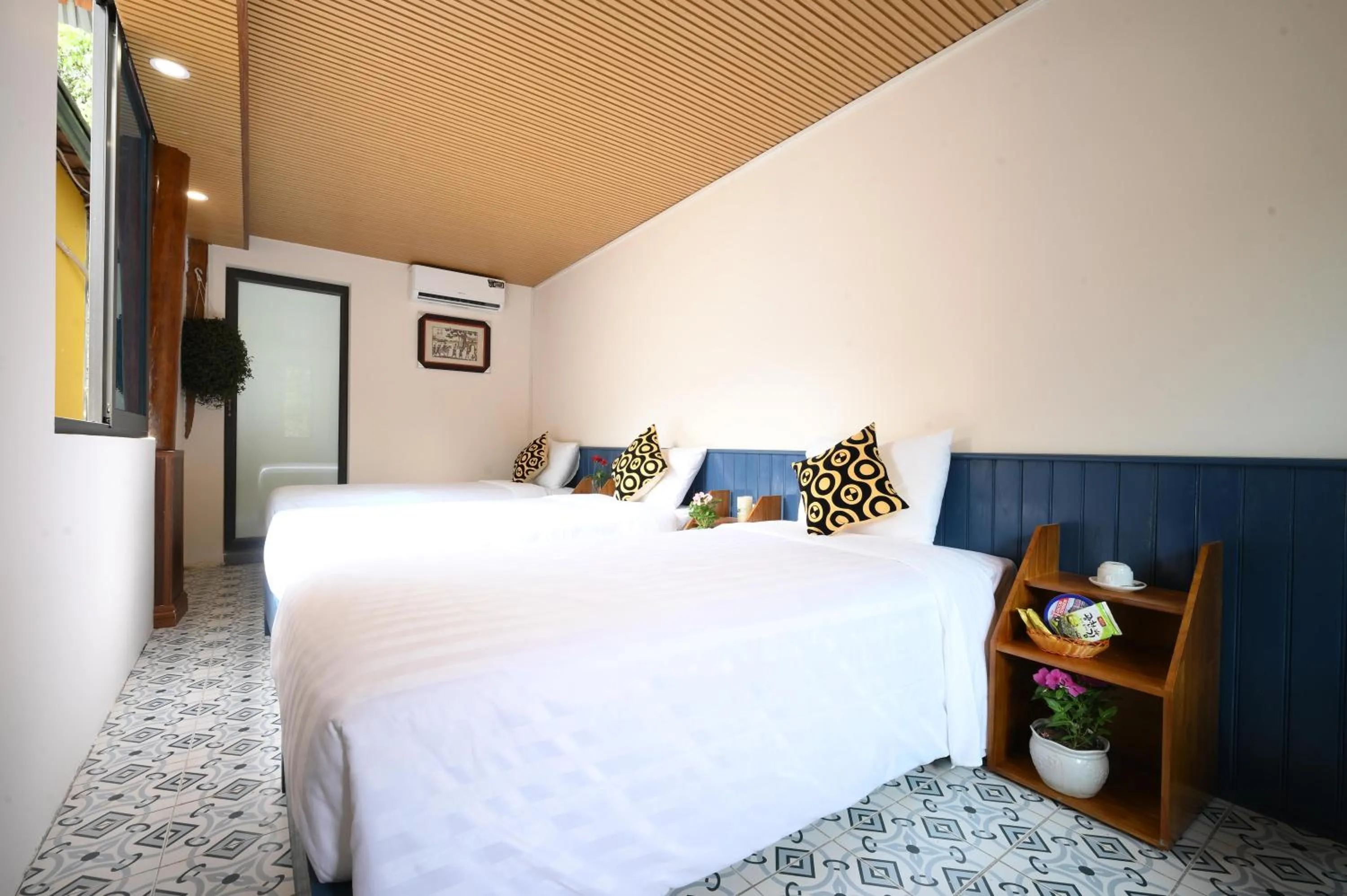 Bed in Catba Papillon Garden Bungalows & Resort