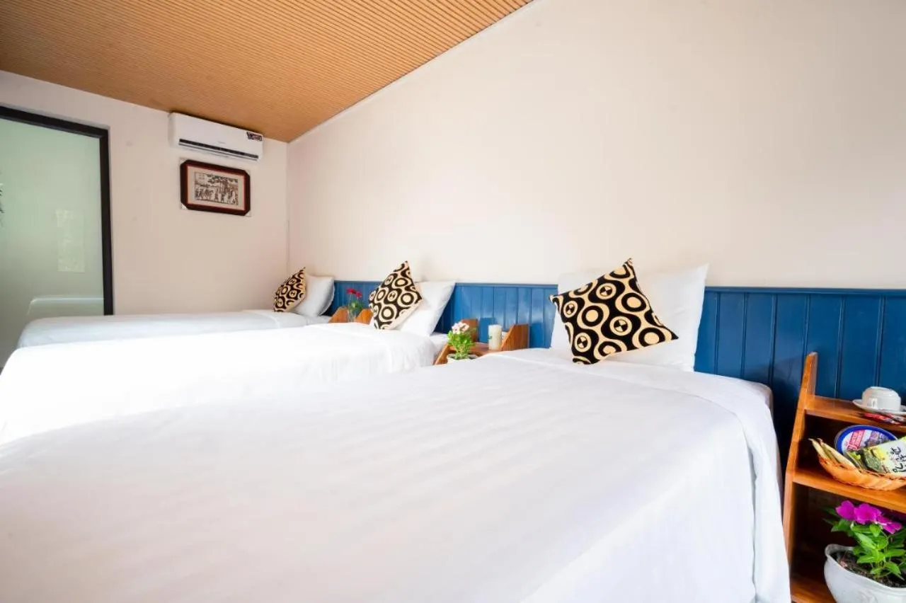 Bed in Catba Papillon Garden Bungalows & Resort