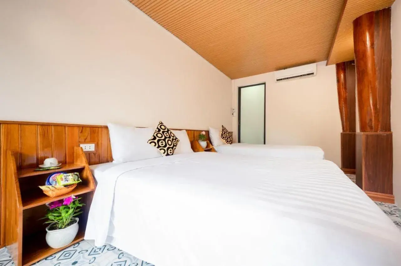 Family Room with Mountain View in Catba Papillon Garden Bungalows & Resort Family Room with Mountain View in Catba Papillon Garden Bungalows & Resort