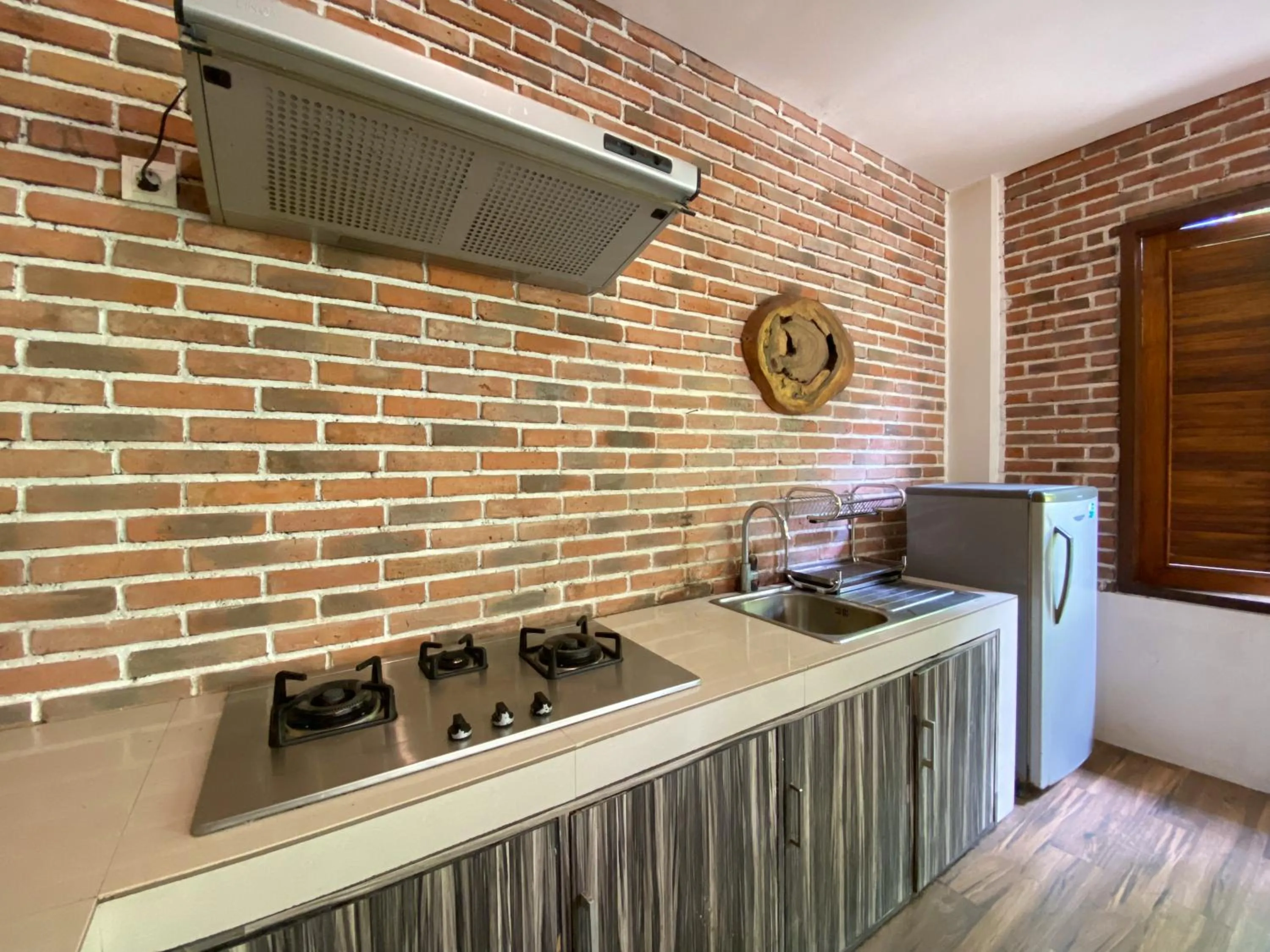 Kitchen or kitchenette in Uma Linggah Resort by Puri Signatures