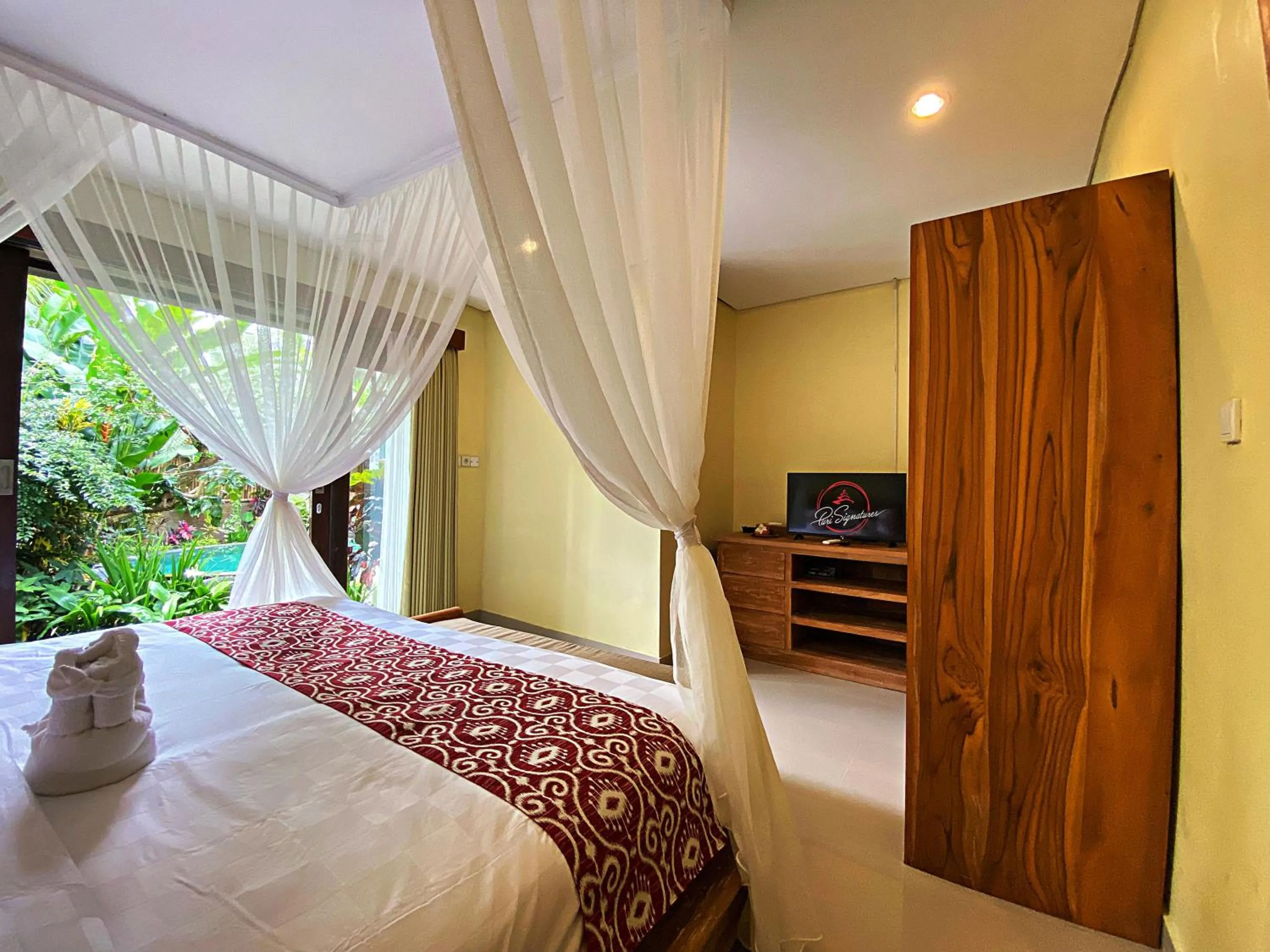 Suite with Garden View in Uma Linggah Resort by Puri Signatures