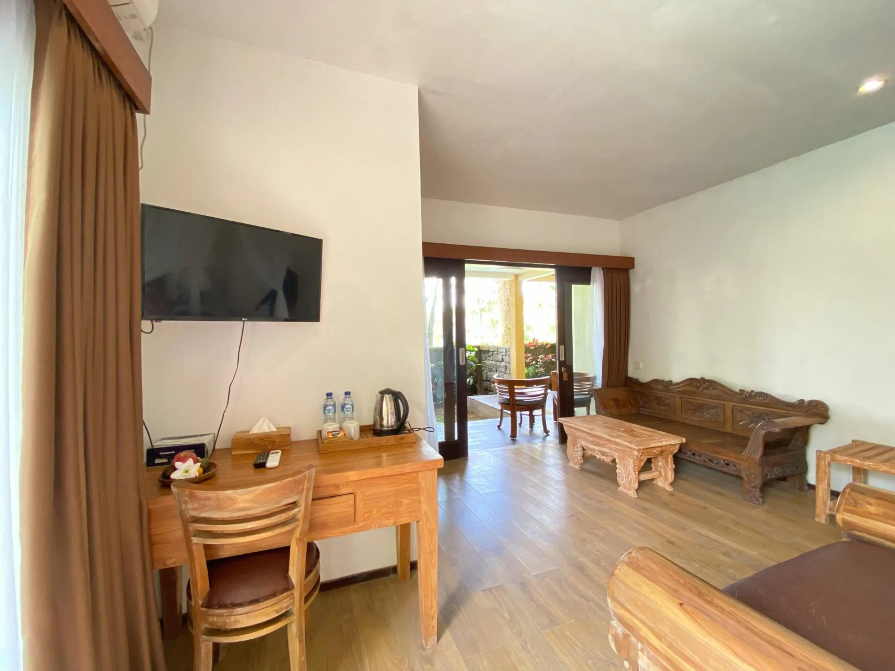 Communal lounge/ TV room in Uma Linggah Resort by Puri Signatures