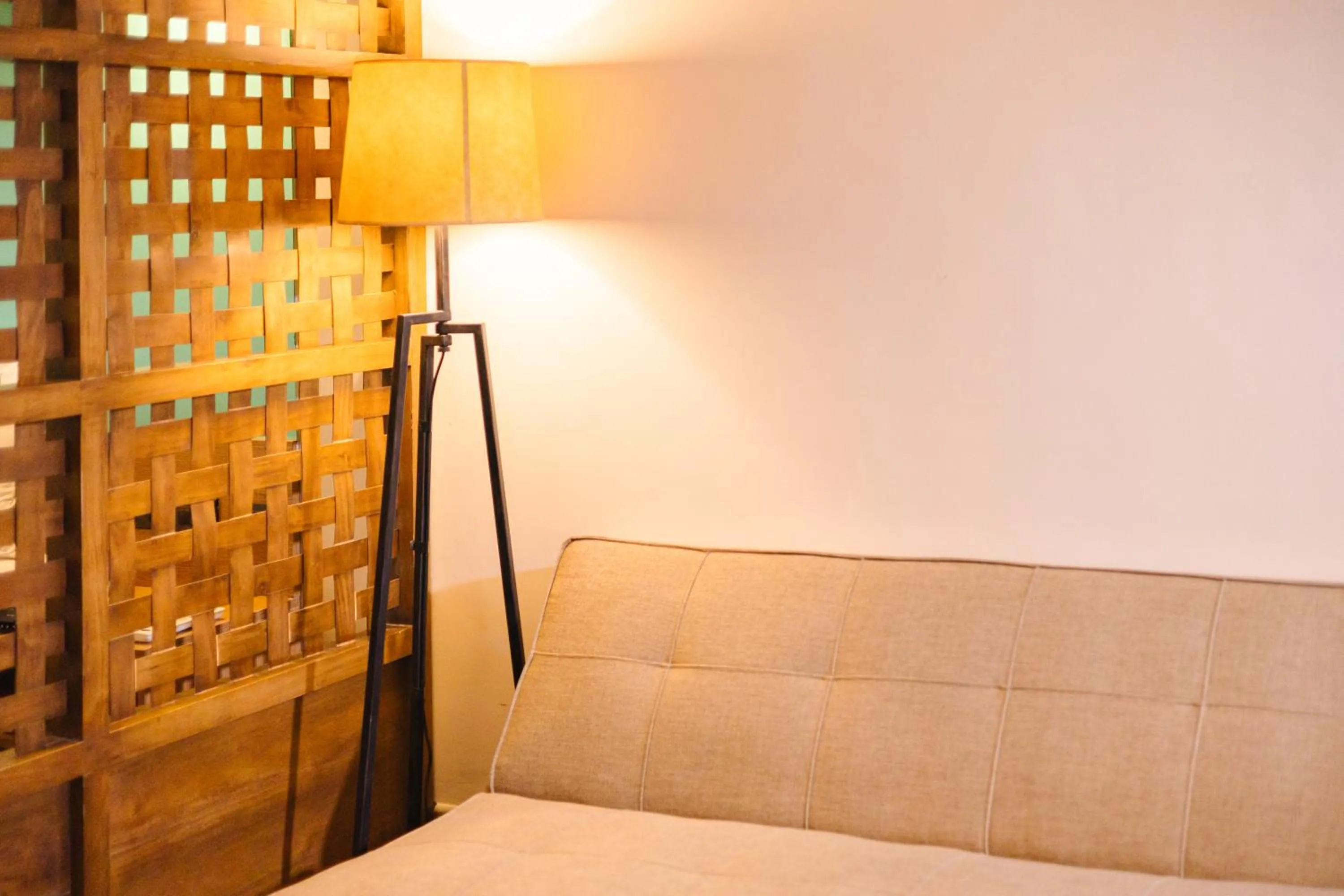 Living room, Bed in Microtel by Wyndham South Forbes near Nuvali