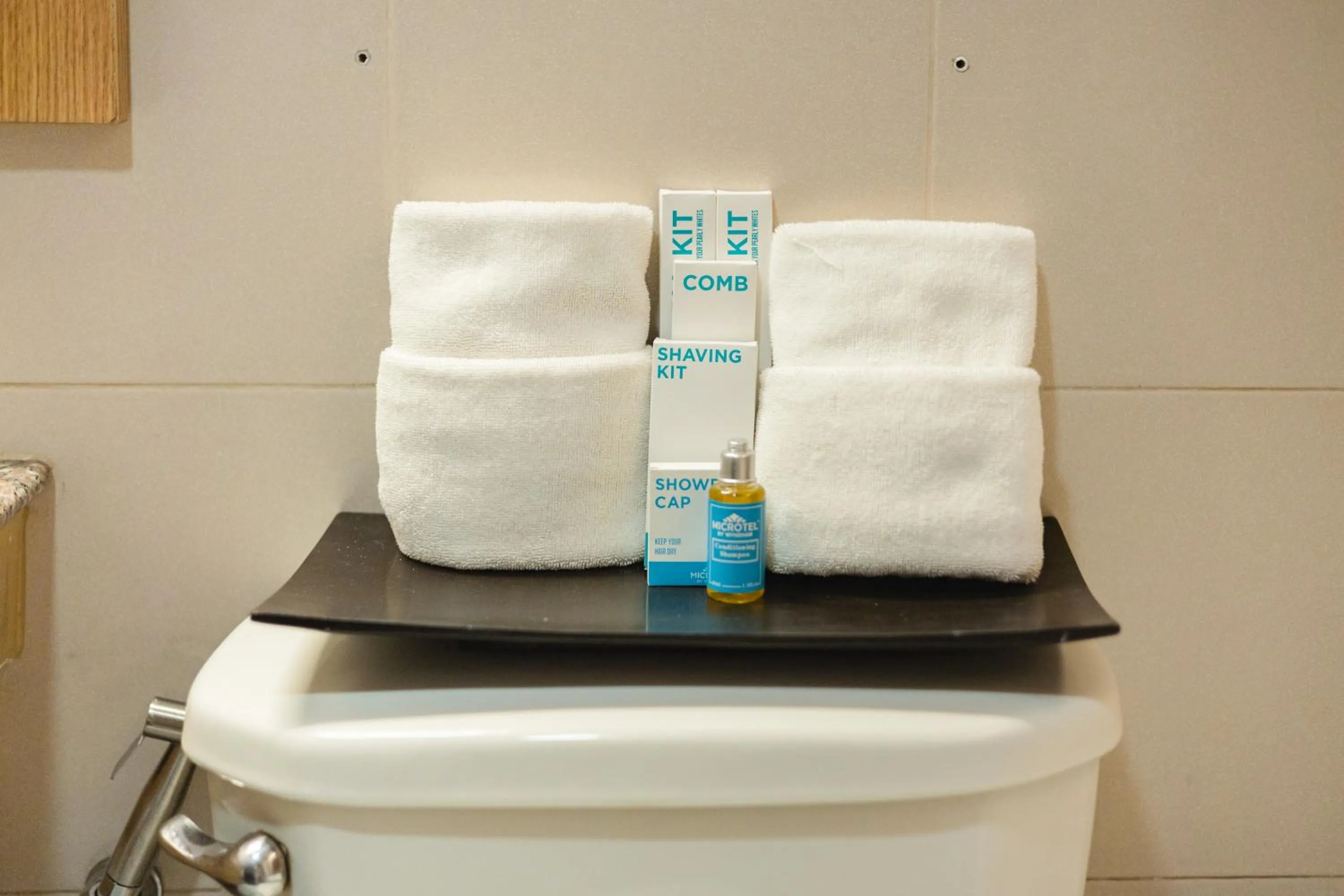 Bathroom in Microtel by Wyndham South Forbes near Nuvali