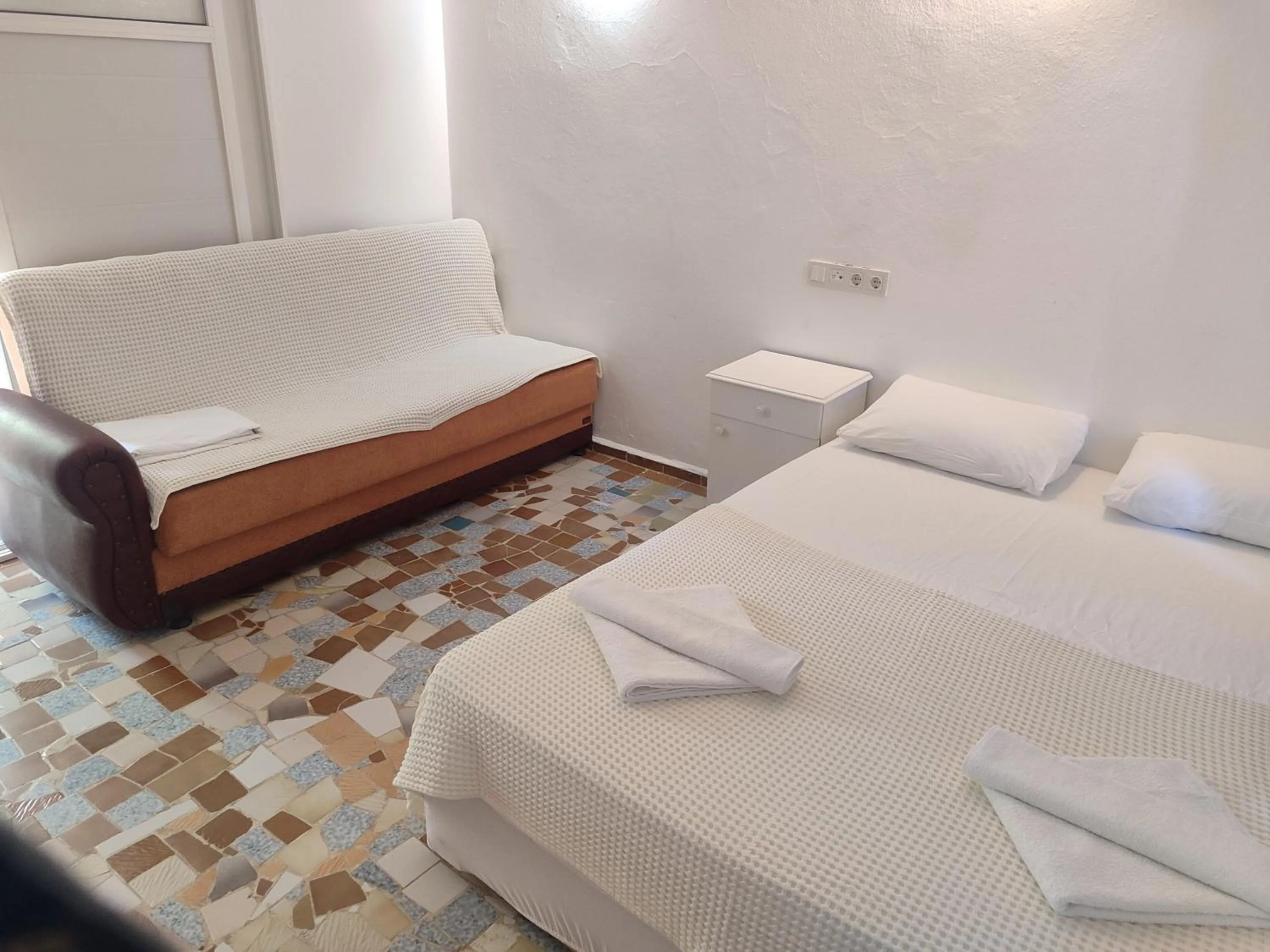 Bed in Hotel Tropicana