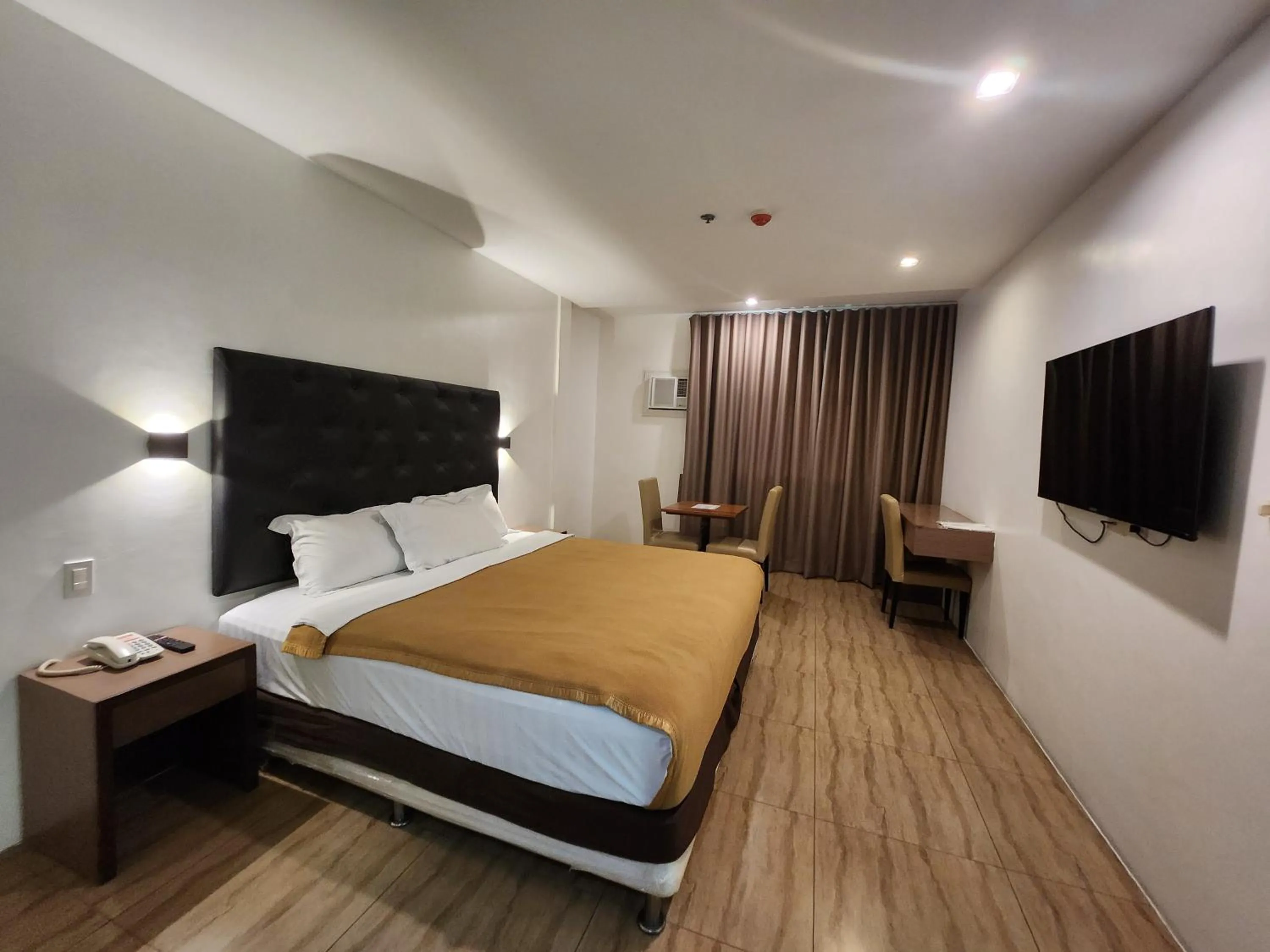 Bed in Apollonia Royale Hotel