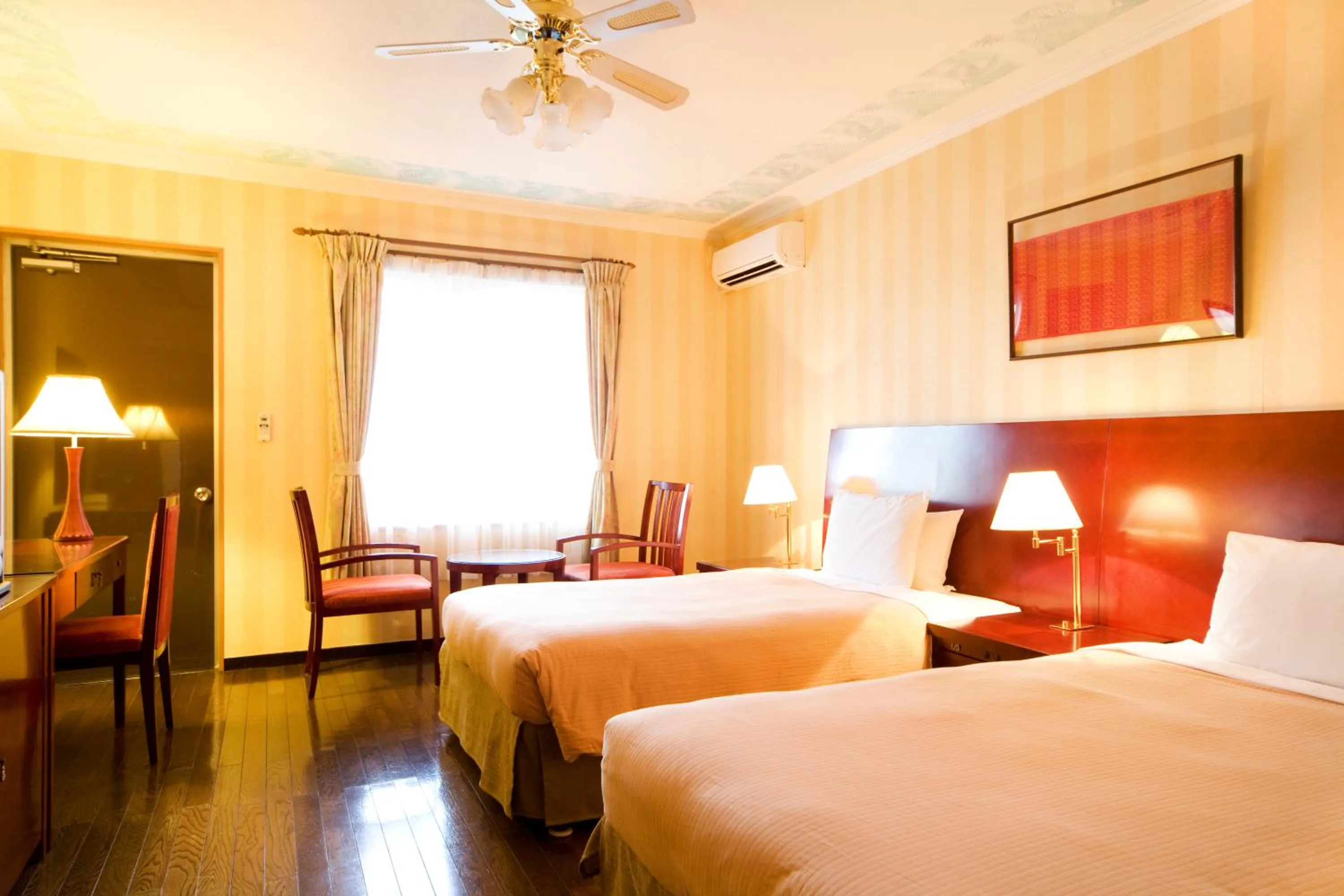 Bed in Coco Garden Resort Okinawa