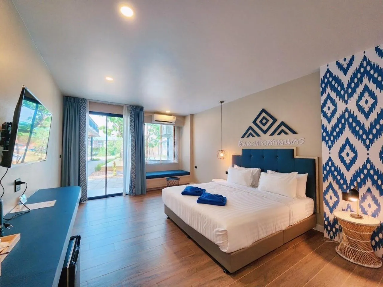 Photo of the whole room, Bed in Phu sakon ville hotel