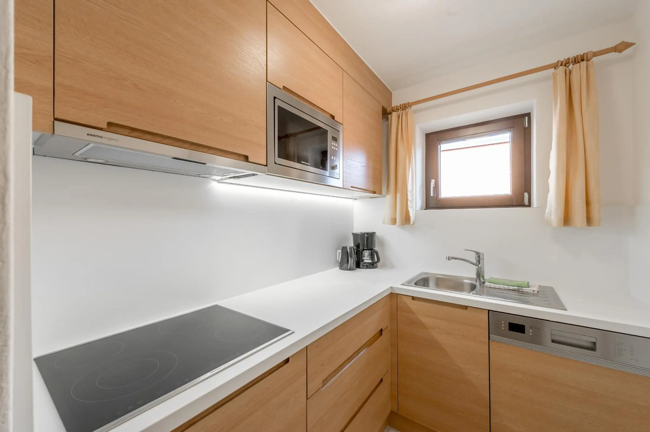 Kitchen or kitchenette in Apart Hotel Garni Wieser