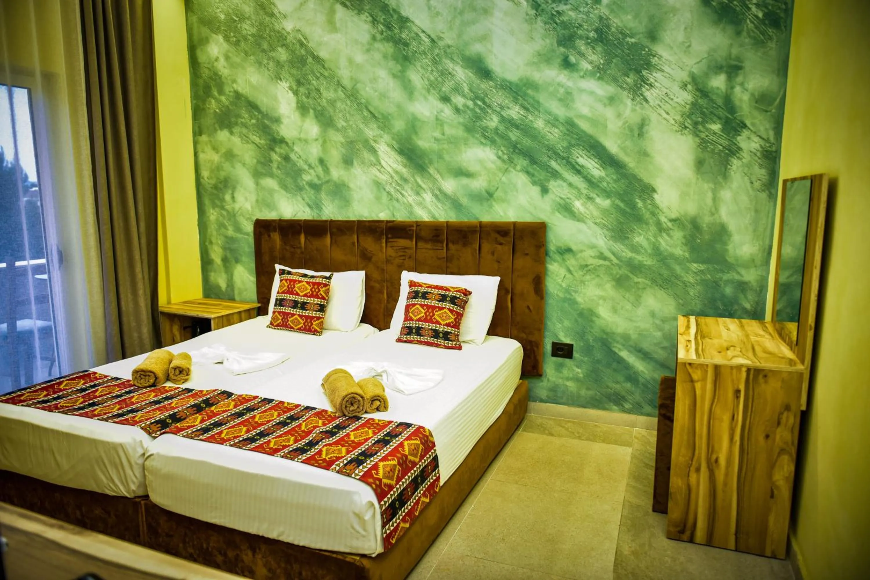 Photo of the whole room, Bed in TE BUJTINA HOTEL- Cozy Stay with Traditional Breakfast Near Beach