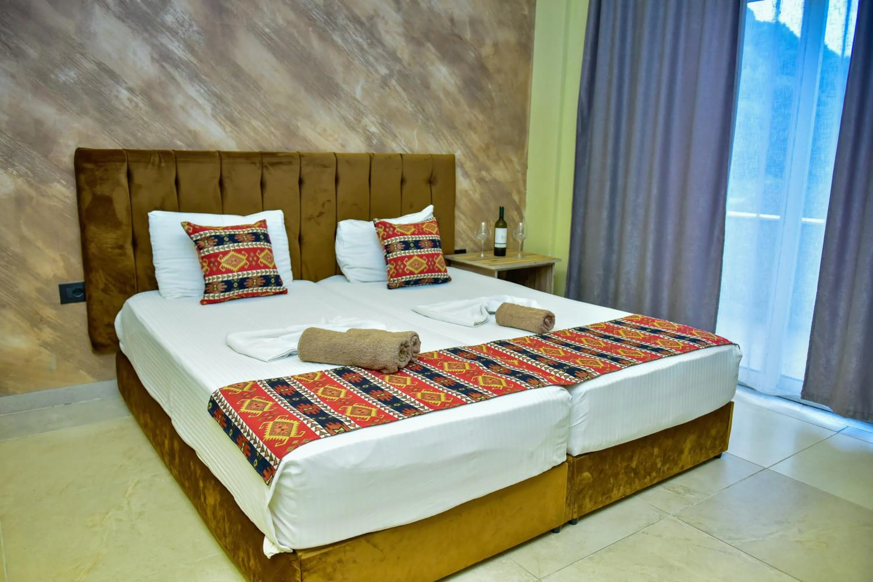 Photo of the whole room, Bed in TE BUJTINA HOTEL- Cozy Stay with Traditional Breakfast Near Beach