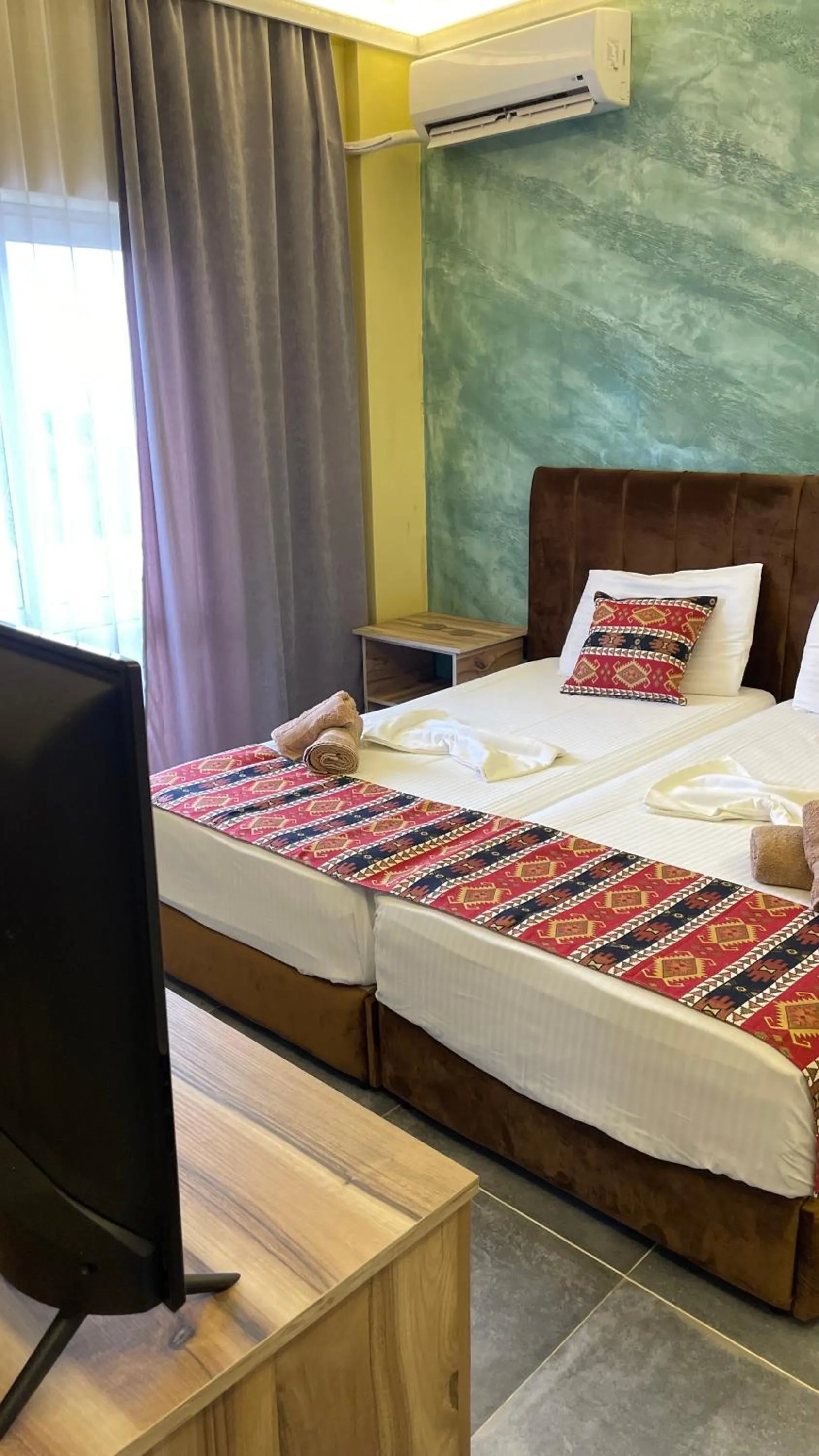 TV and multimedia, Bed in TE BUJTINA HOTEL- Cozy Stay with Traditional Breakfast Near Beach