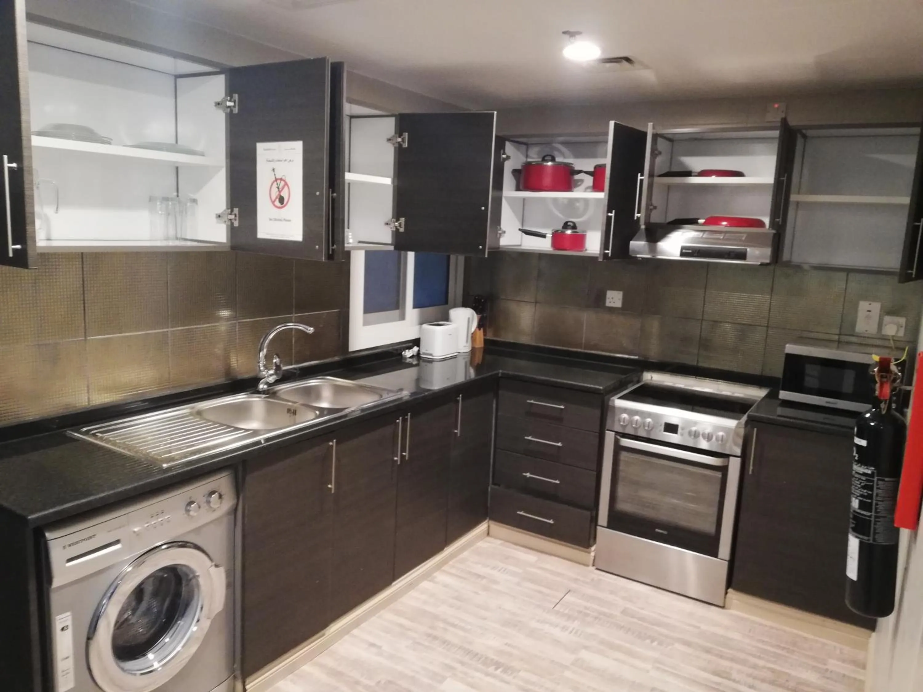 Kitchen or kitchenette in Boulevard City Suites Hotel Apartments