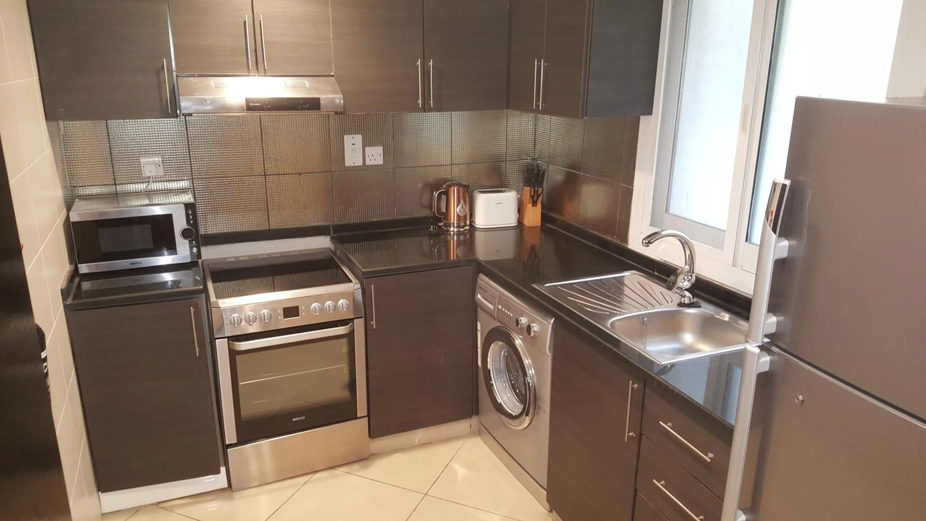 Kitchen or kitchenette in Boulevard City Suites Hotel Apartments