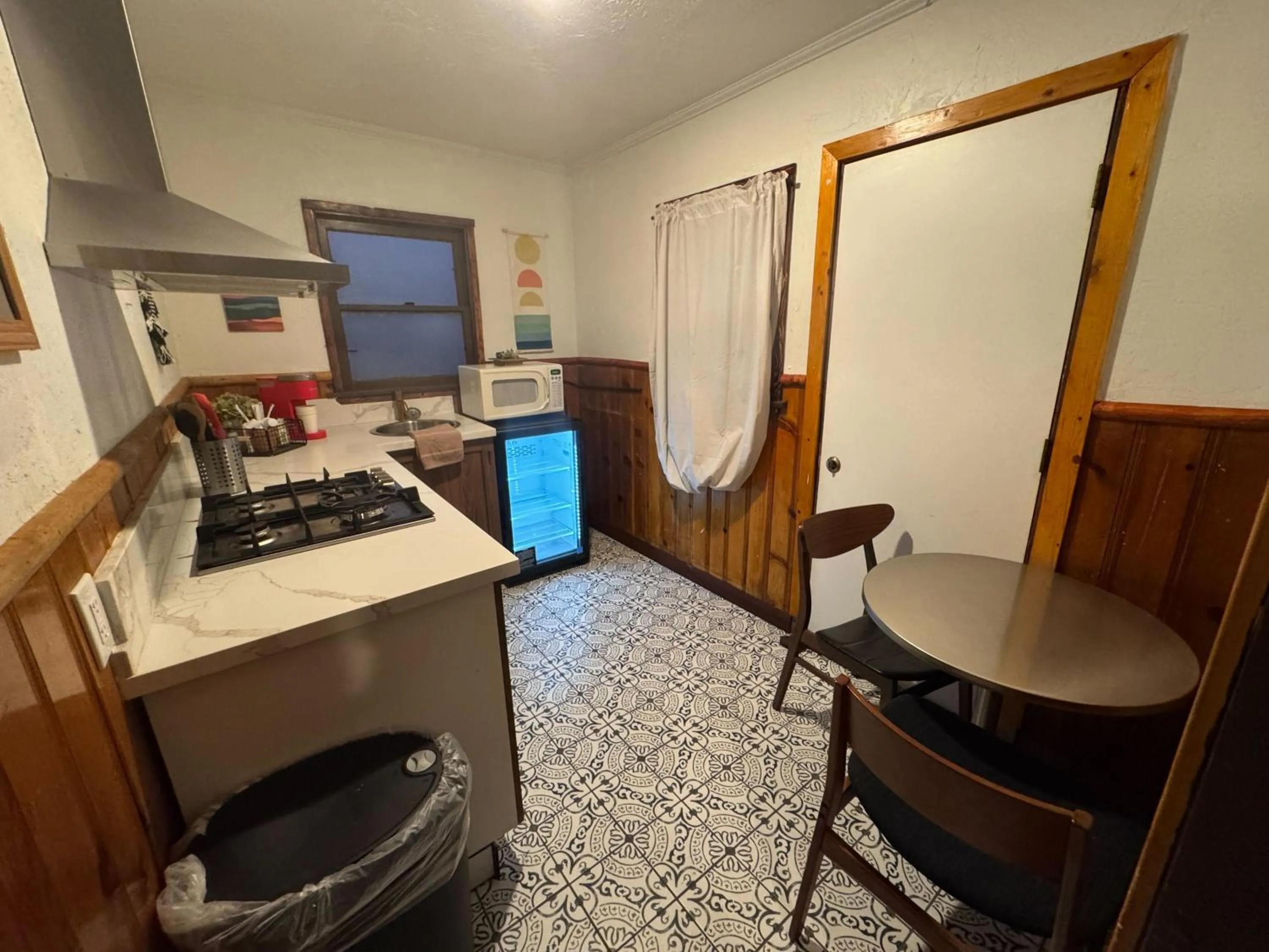 Kitchen or kitchenette in Three Pines Cabins