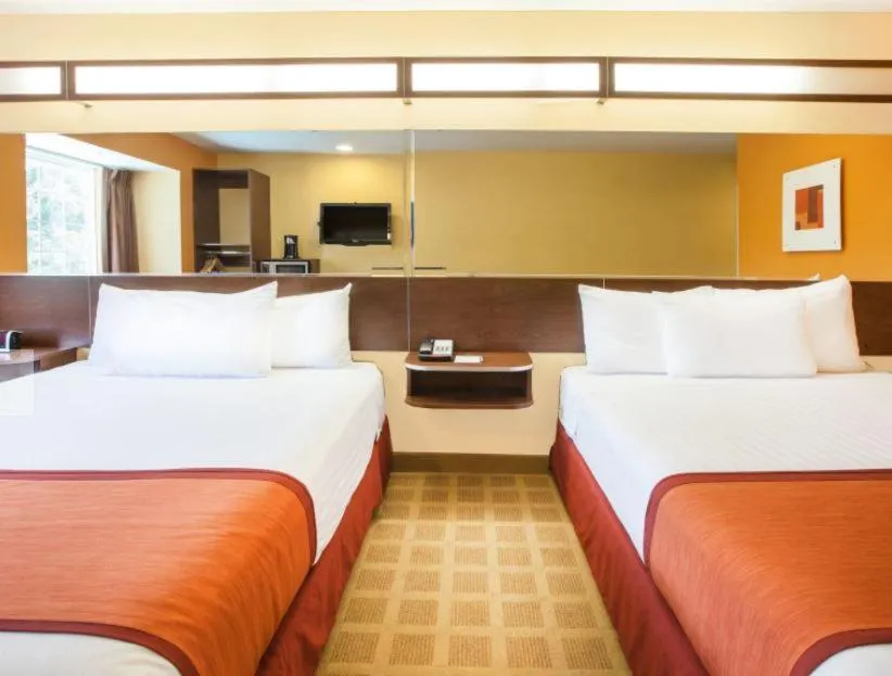 Bedroom, Bed in Microtel Inn by Wyndham Stillwater