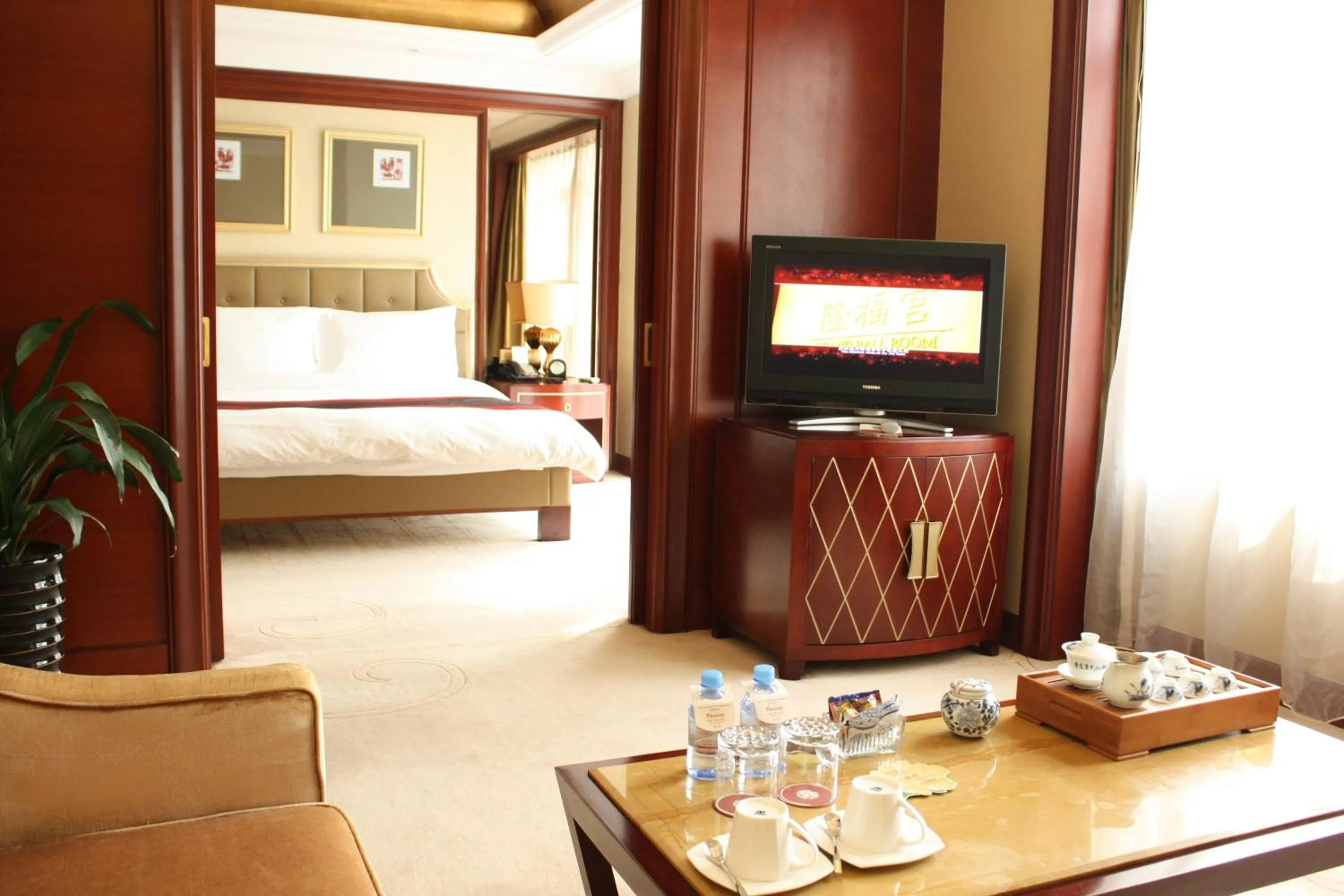 Bed in Dynasty International Hotel Dalian