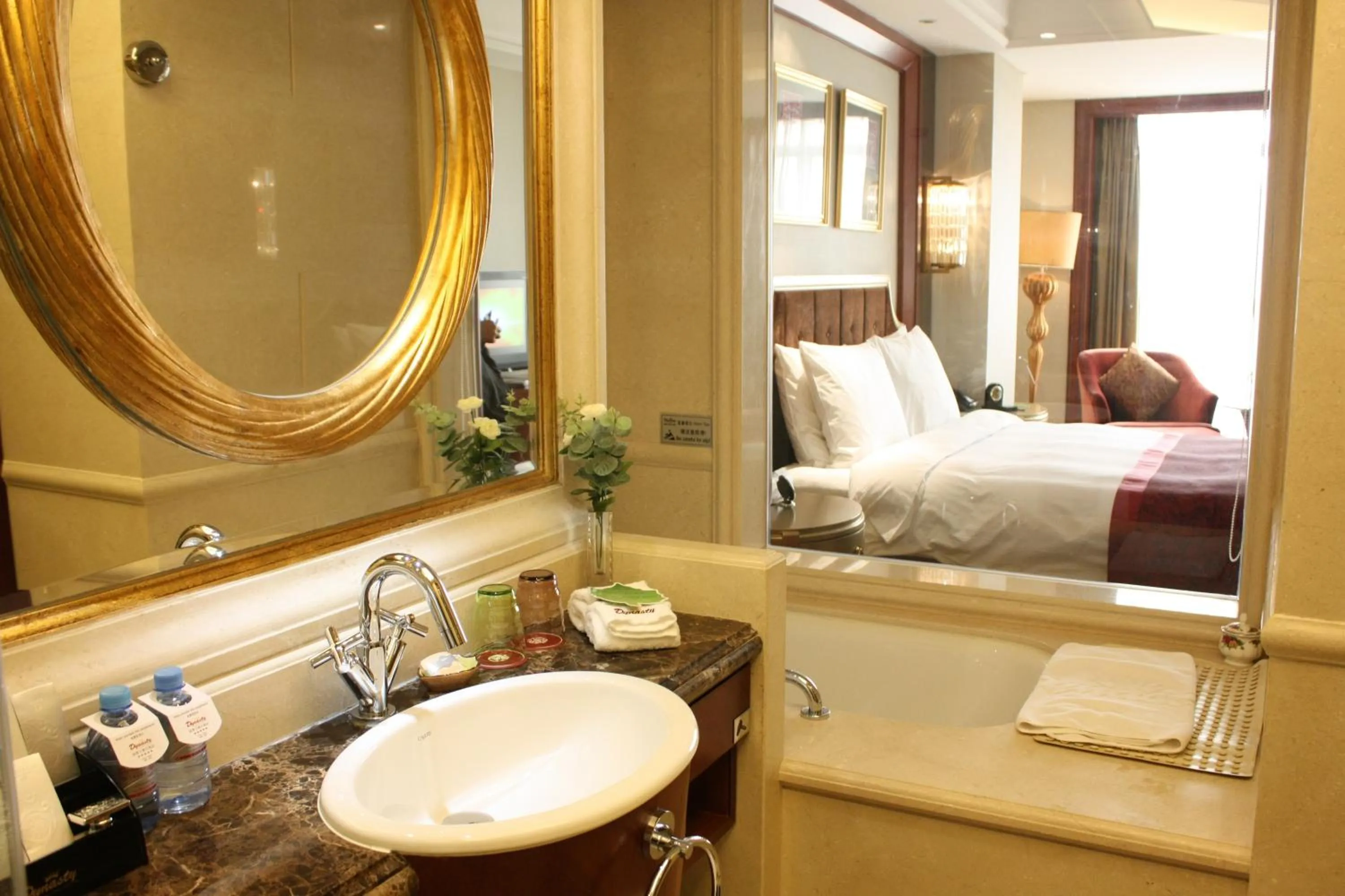 Bathroom, Bed in Dynasty International Hotel Dalian