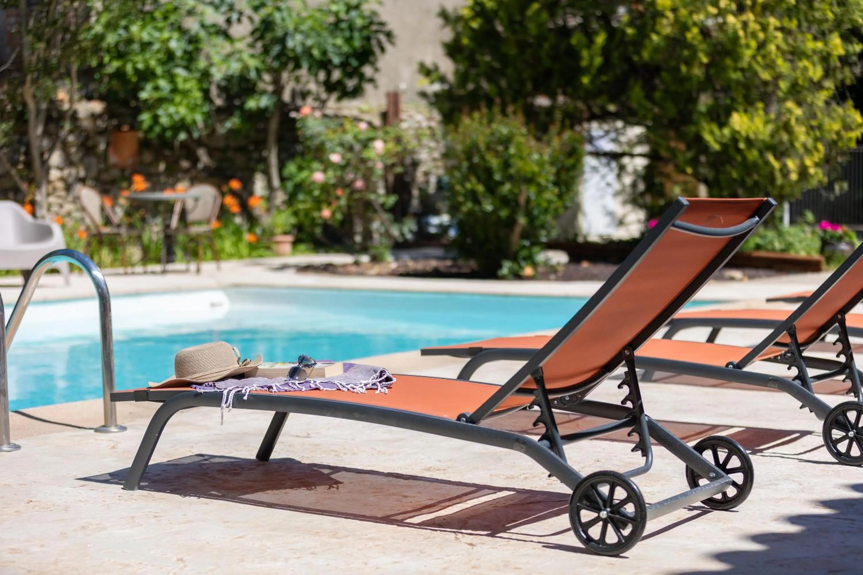 Swimming pool in Hotel Les Bellugues