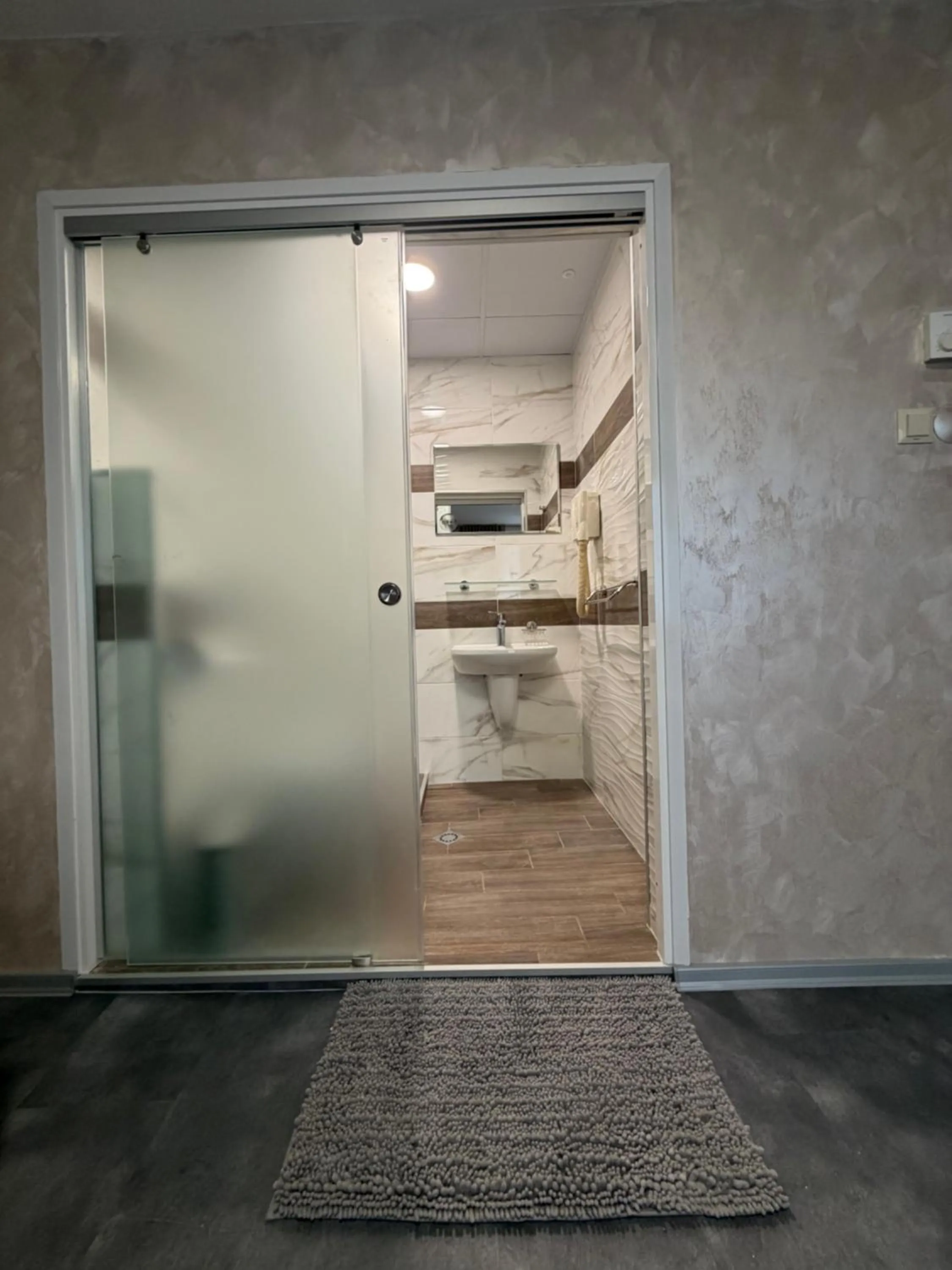 Bathroom in Brani Family Hotel