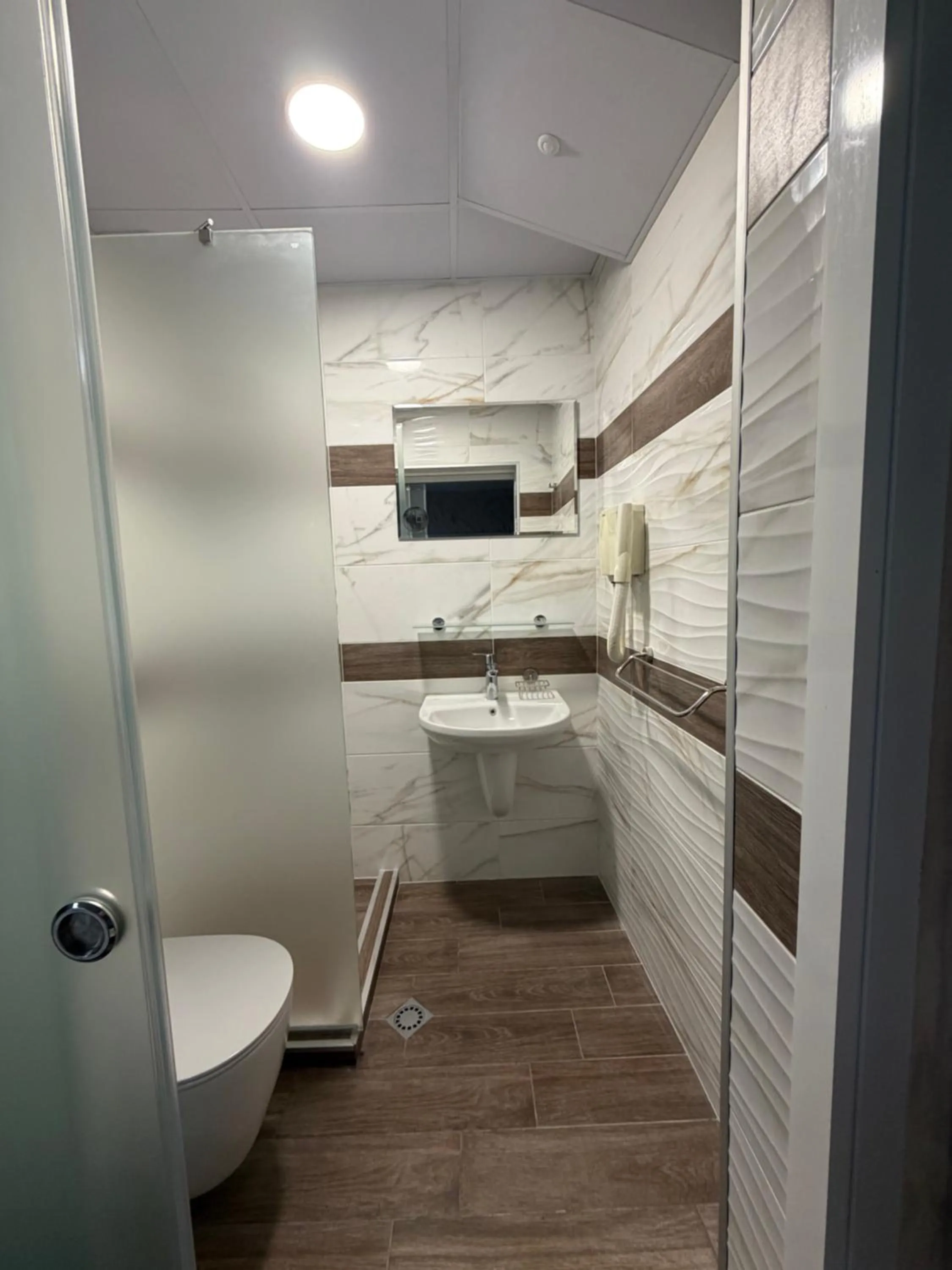 Bathroom in Brani Family Hotel