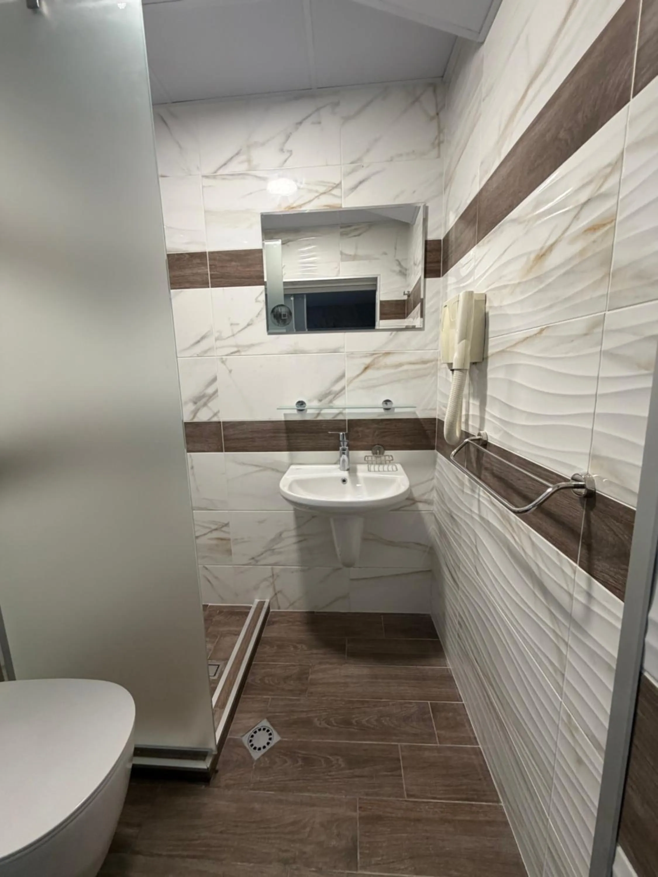 Bathroom in Brani Family Hotel