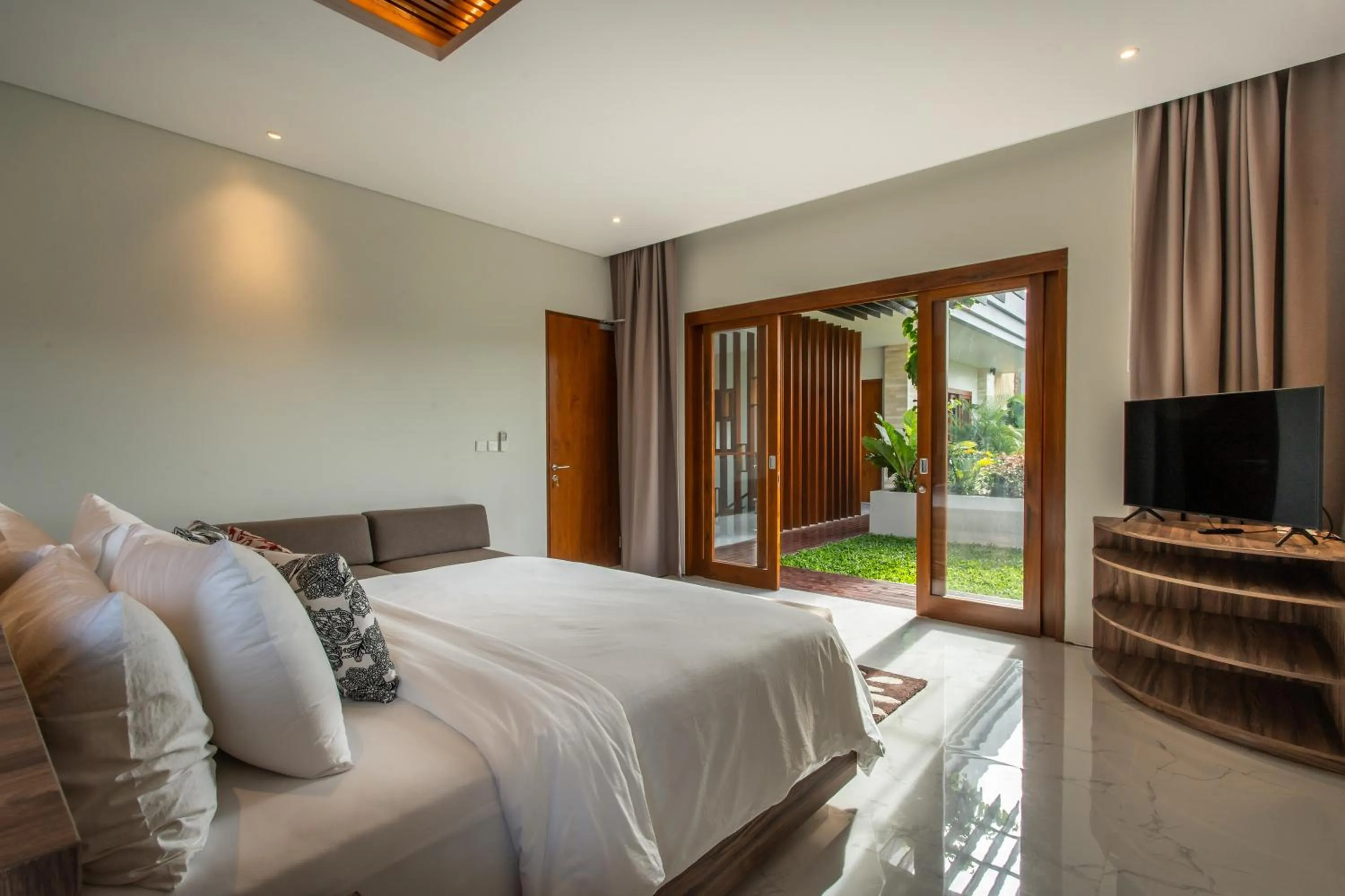 Garden view, Bed in The Amarta Villa