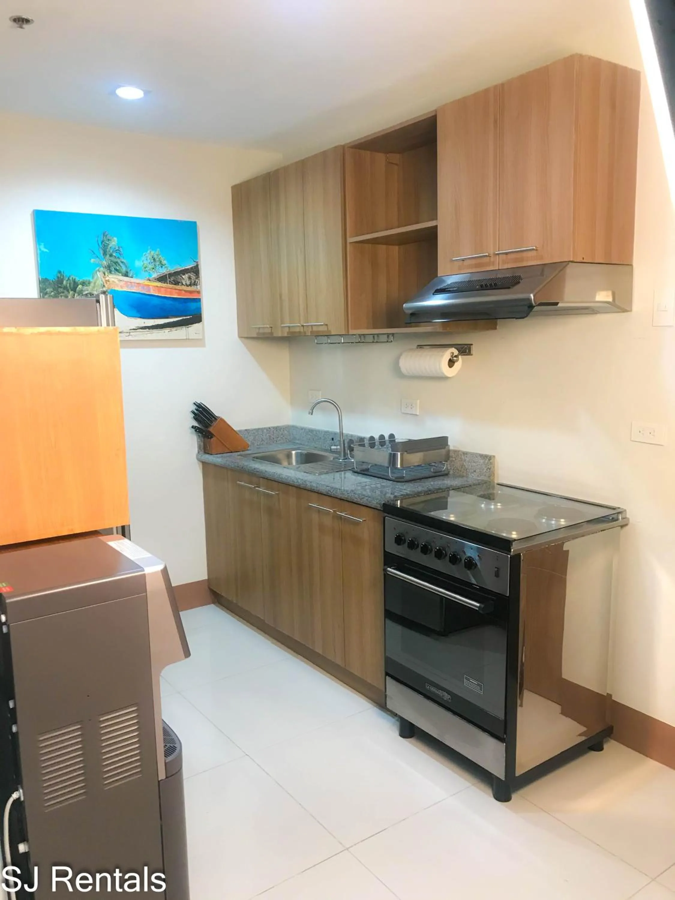 kitchen in 2 Bedroom Condo @ Midpoint Residences w/ City View