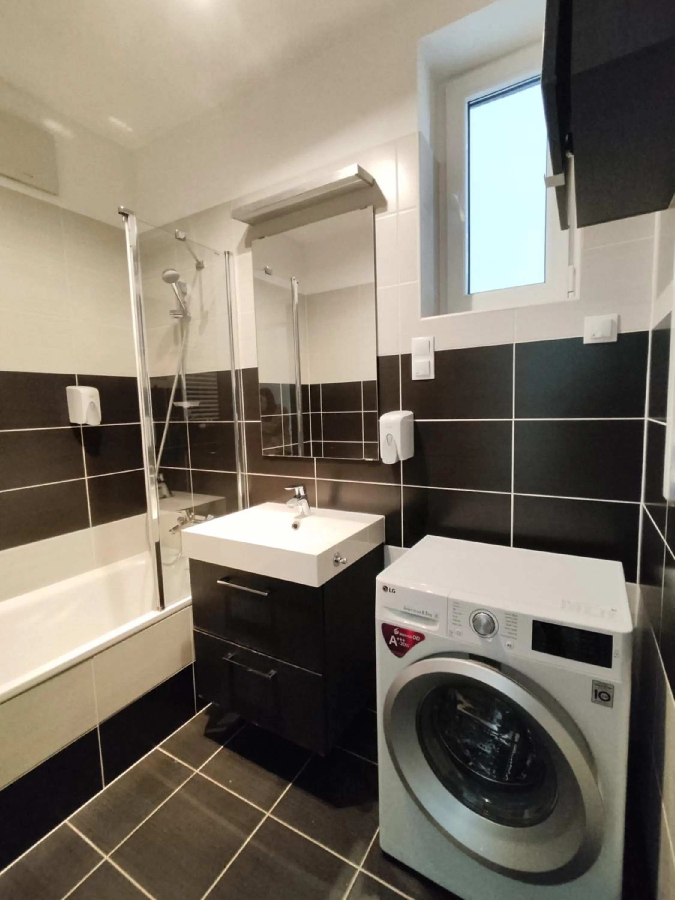 Bathroom in Corvin Center Suites