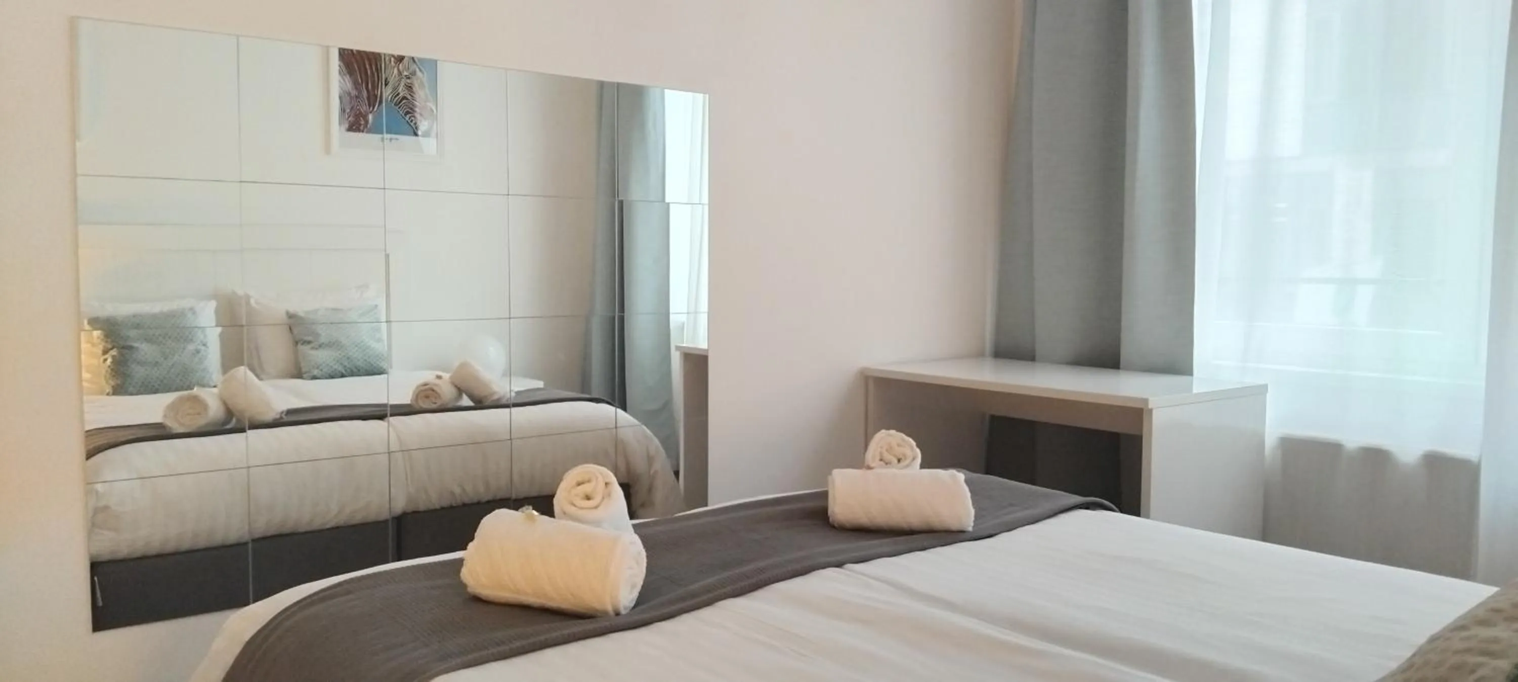 Bedroom, Bed in Corvin Center Suites