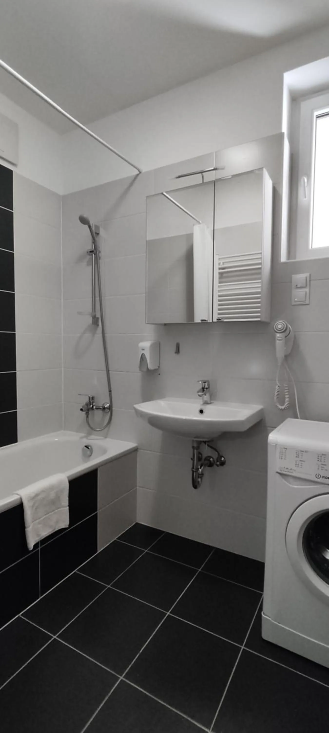 Bathroom in Corvin Center Suites