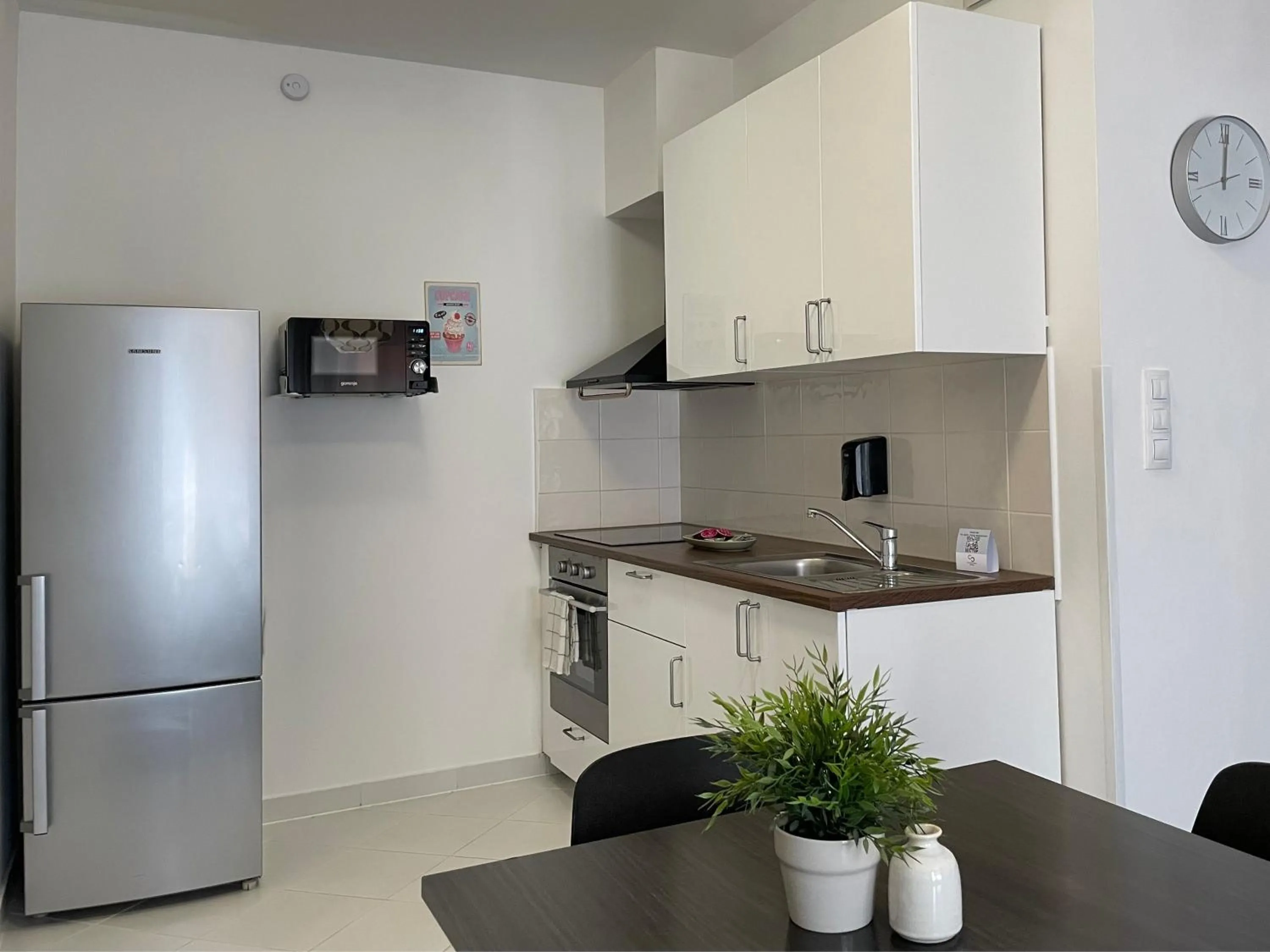 Kitchen or kitchenette in Corvin Center Suites