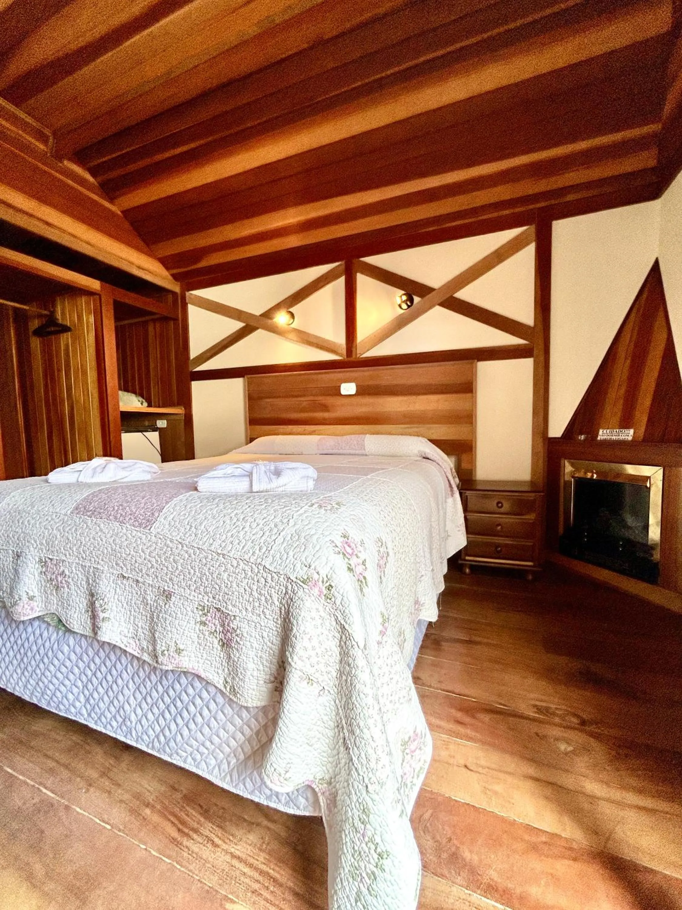 Bed in Pousada dos Esquilos