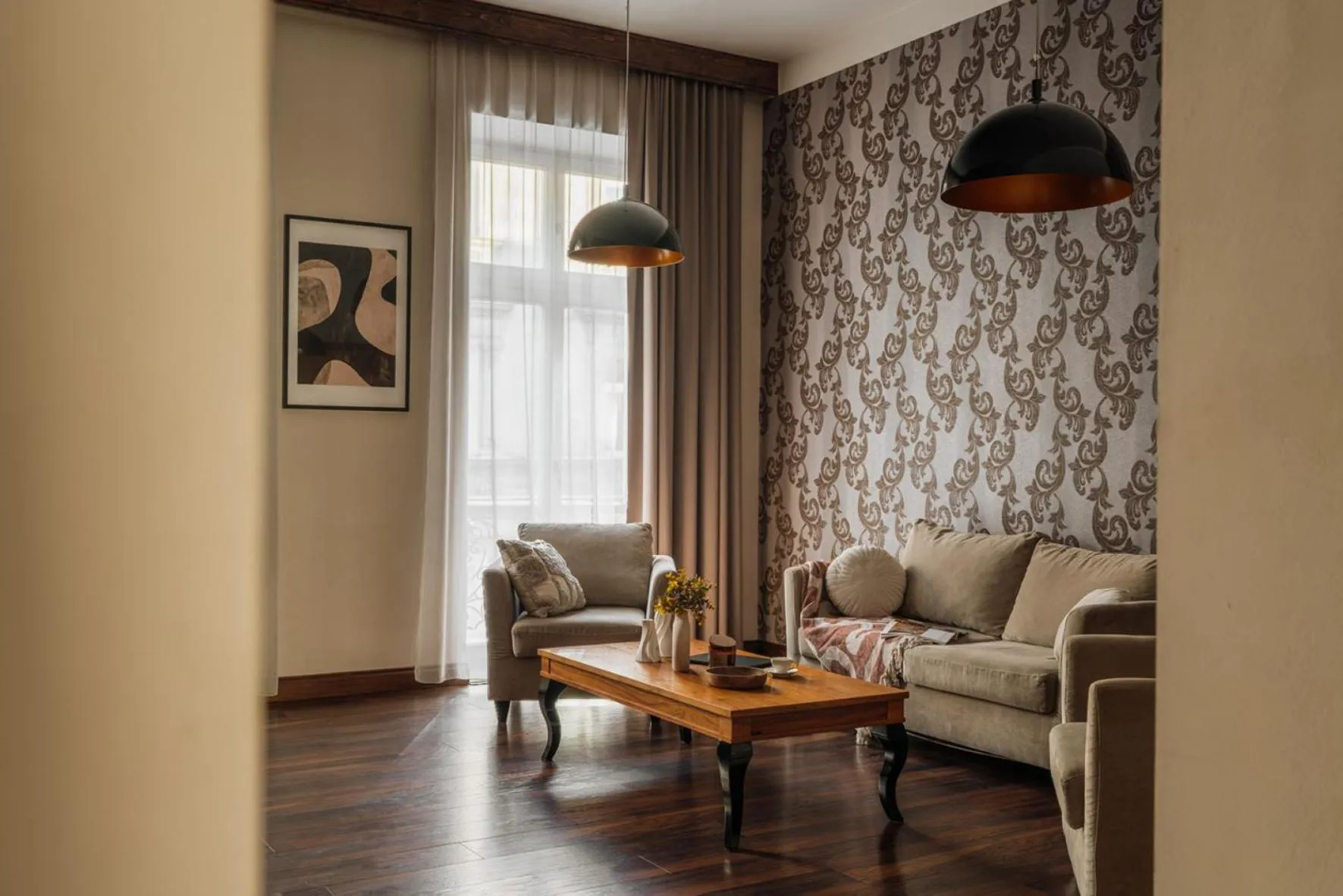 Living room in Topolowa Residence by StayLab